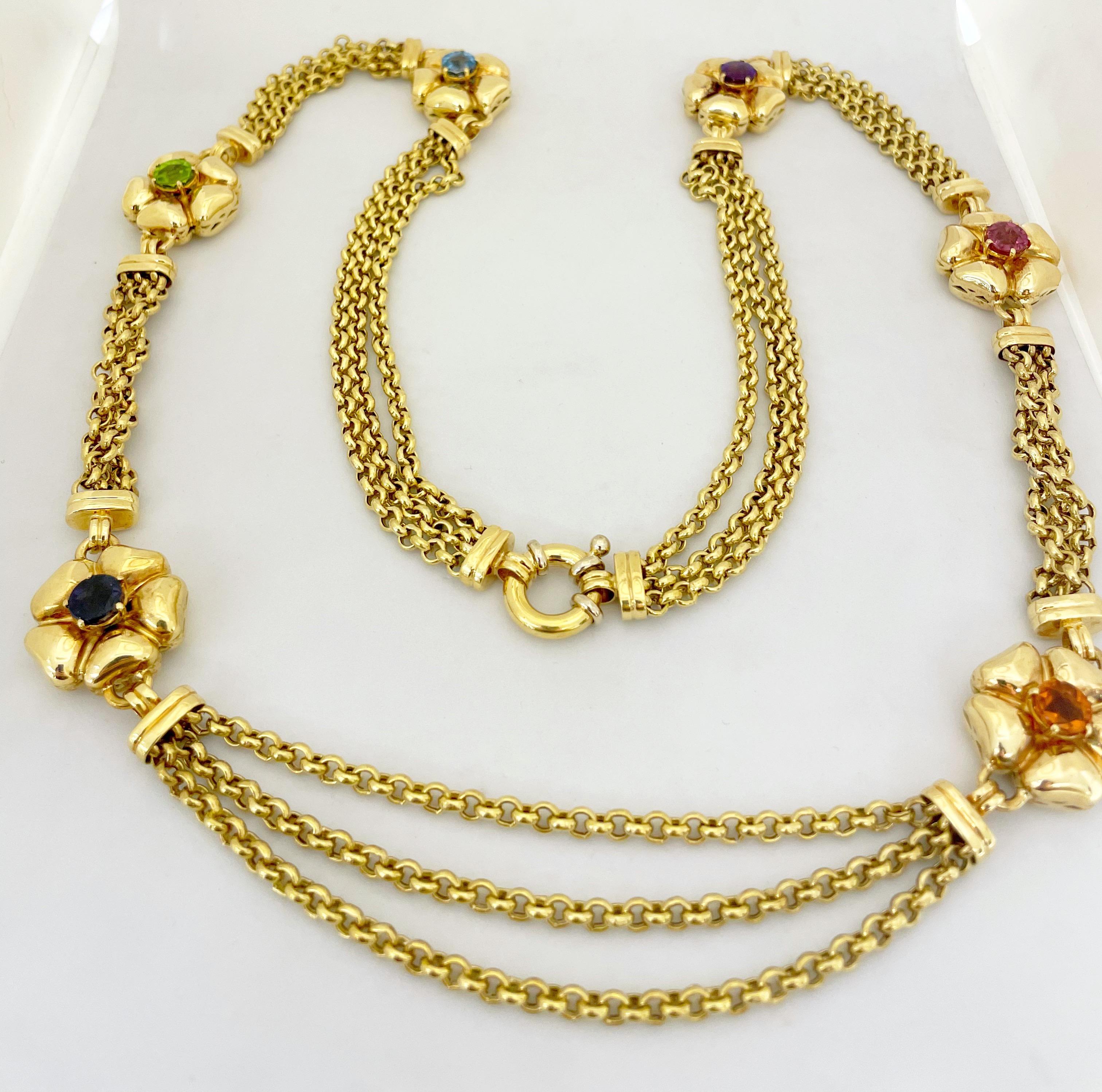 Italian Jewelers for more than three generations, VAID has produced merchandise exclusively for some of the most renowned jewelers across the world. This VAID 18 karat yellow gold necklace is designed with 6 shiny gold flowers each with a round semi