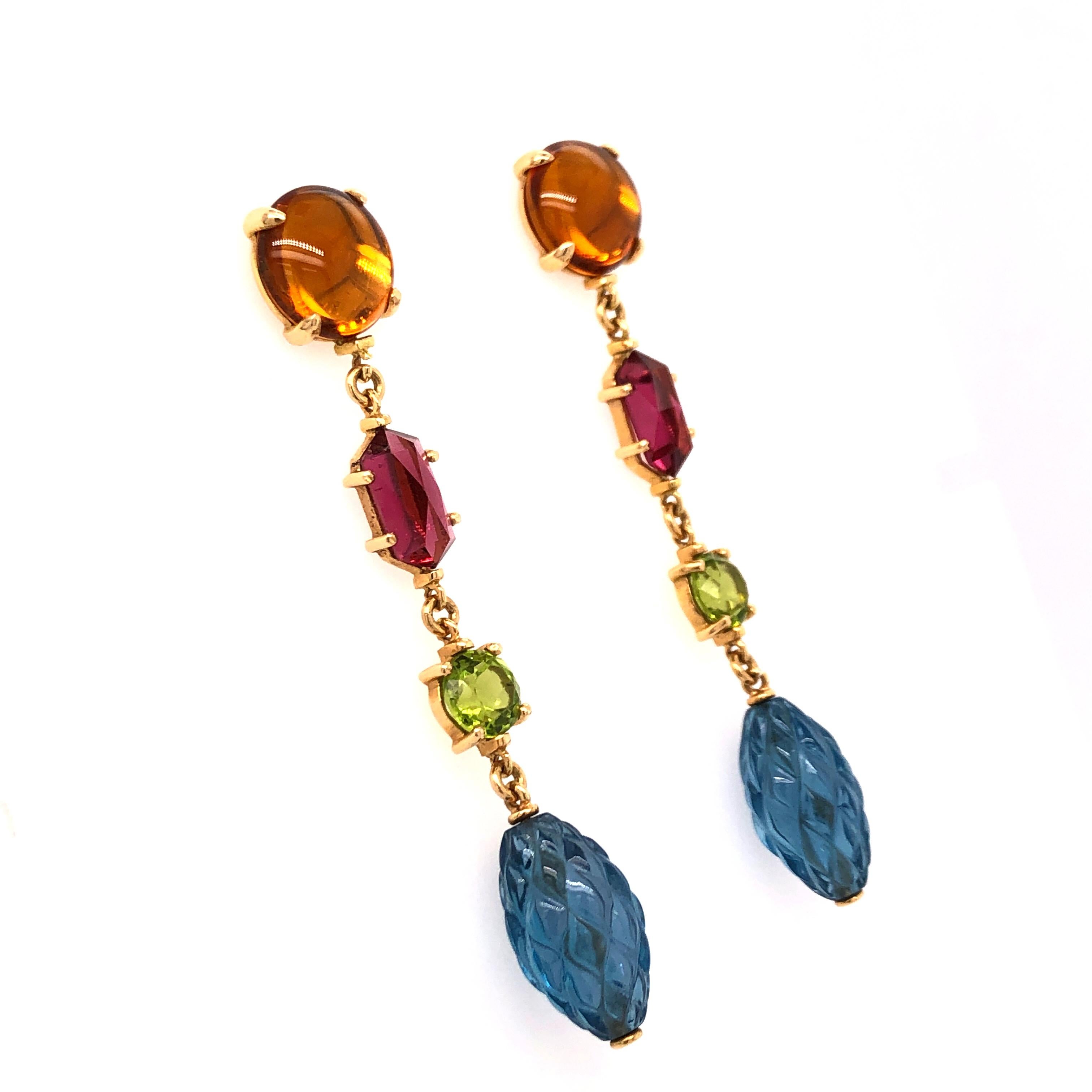 Straight from the house of Vaid Roma these Citrine, Tourmaline, Peridot, and Topaz earrings bring a playful splash of color to your outfit. The stones are set in 18 karat gold.

