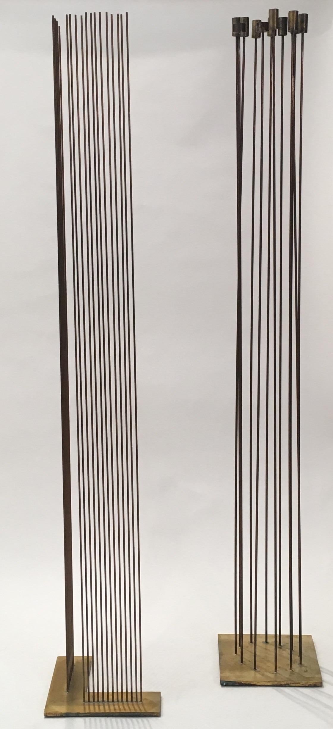 Contemporary artist Val Bertoia's pair of Sound Sculptures made in 2012 are part of the Bertoia Sonambient series. The full circle piece is made of 10 brass tops and 2 bronze tops silvered to beryllium-copper rods then silvered to a brass base.
