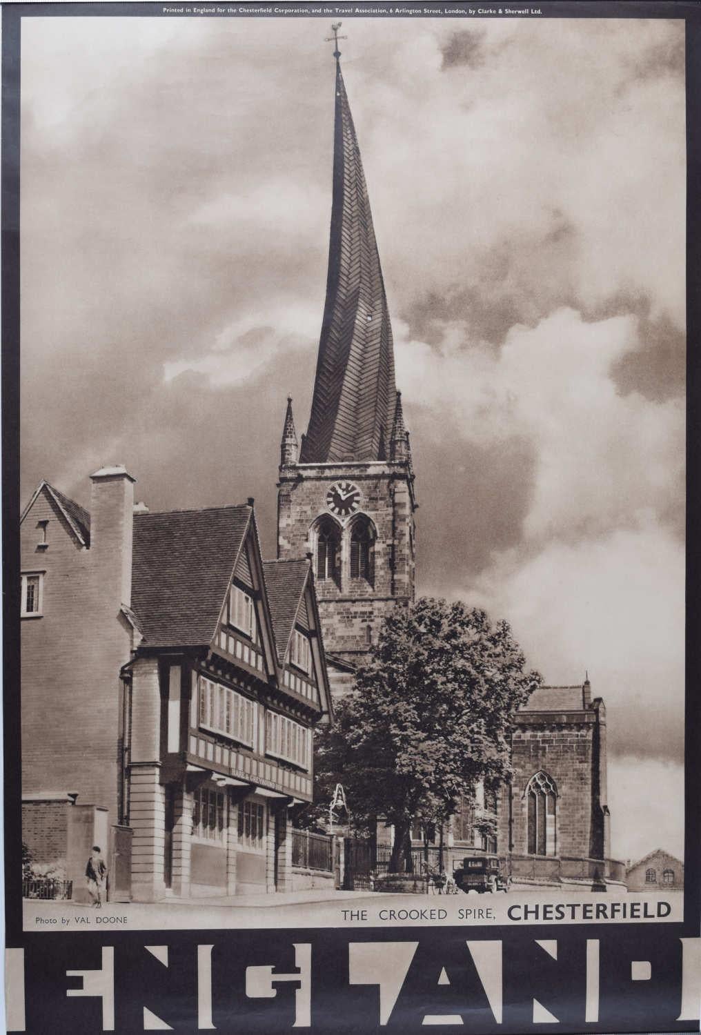 Val Doone 
The Crooked Spire, Chesterfield 
76 x 51 cm 
Lithograph 

Published by the Travel Association of Great Britain and N.Ireland this beautiful photographic image encouraged travel to Chesterfield and the United Kingdom more generally. This