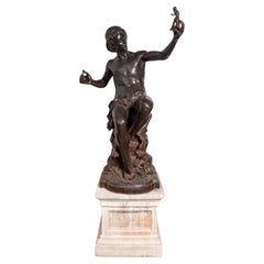 Escultura de hierro fundido Val D'Osne sobre pedestal de piedra