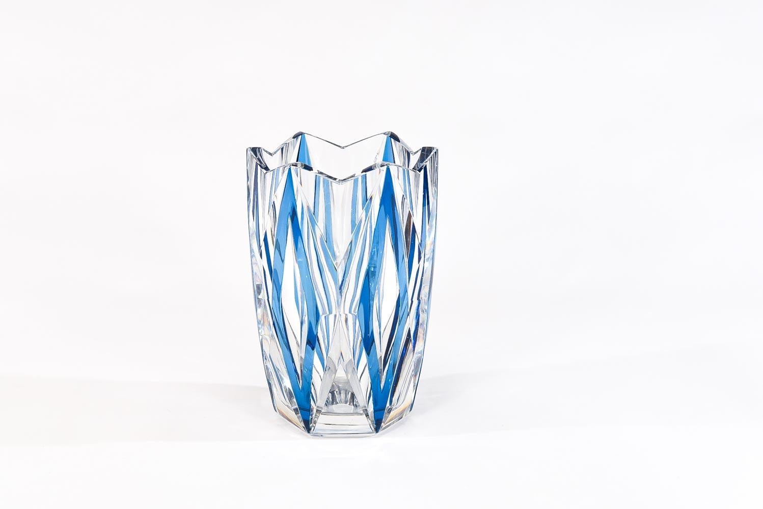 This signed Val Saint Lambert Art Deco turquoise overlay cut to clear vase exemplifies the Art Deco period at its finest. The unusual teal blue/turquoise overlay is cut to clear with clean lines in an Art Deco motif, designed by one of the master