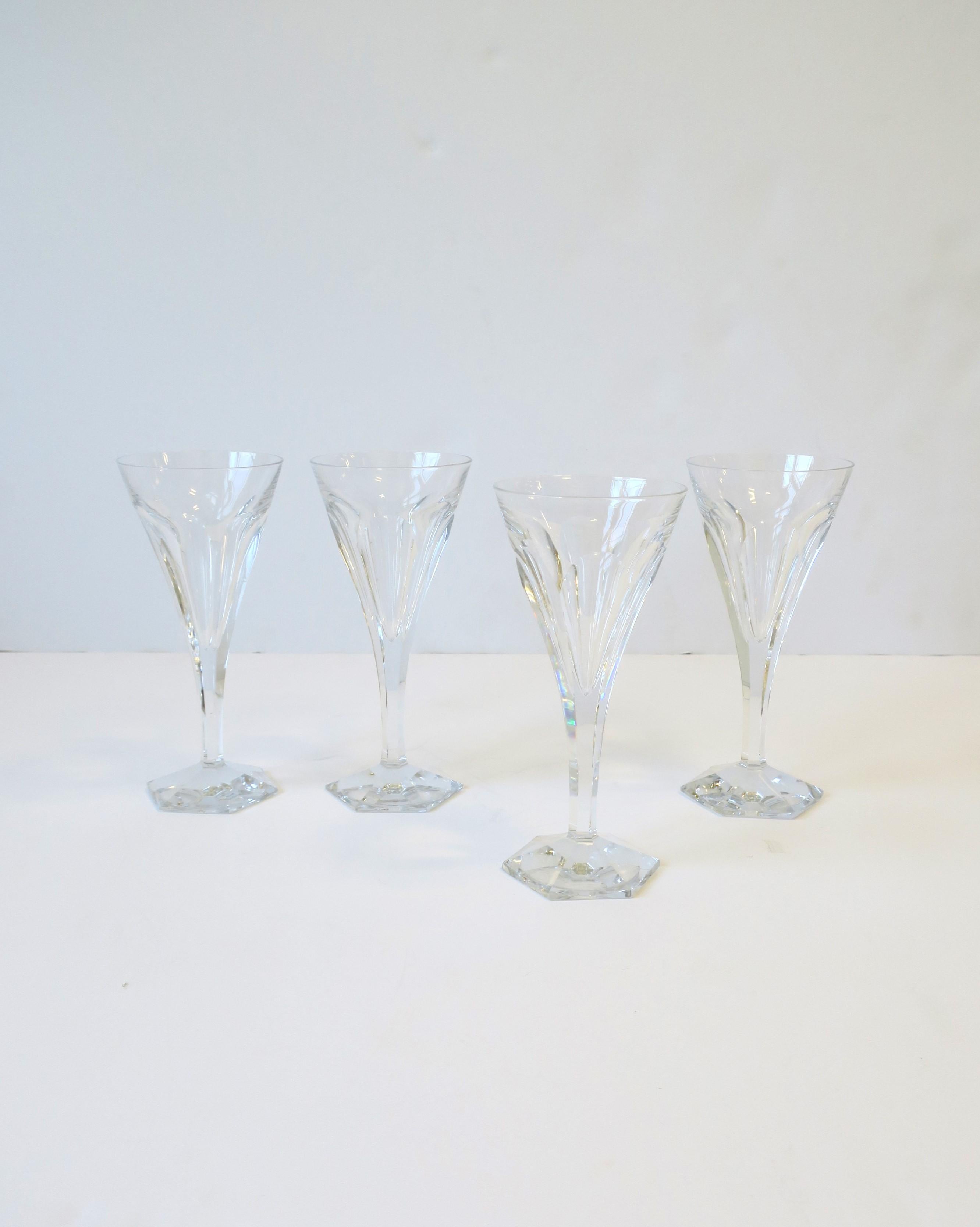 A beautiful and substantial set of four (4) Belgian crystal wine or cocktail glasses from luxury crystal Maison, Val Saint Lambert, circa late-20th century, Belgium. A great set for any bar, bar cart, china cabinet, etc. Beautiful to serve a