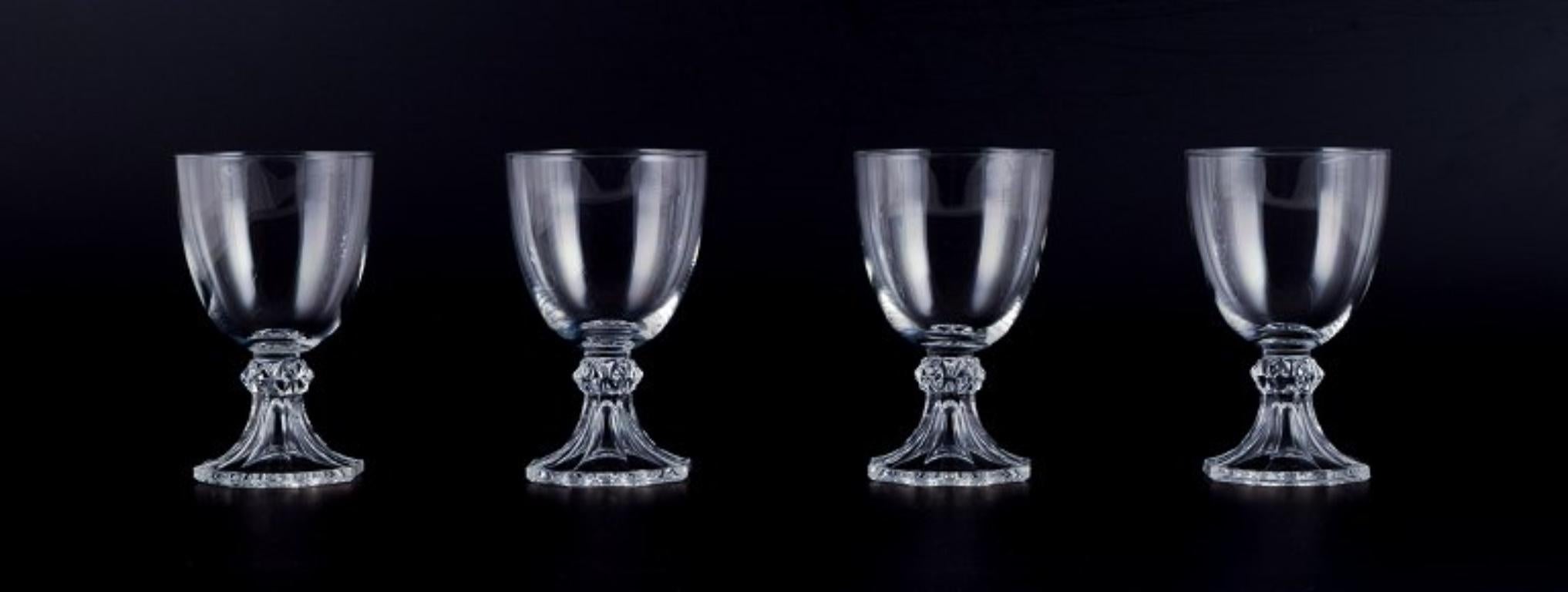 Val Saint Lambert, Belgium. 
A set of four red wine glasses in mouth-blown crystal glass.
Mid-20th century.
Perfect condition.
Dimensions: Diameter 8.5 cm x Height 14.5 cm.