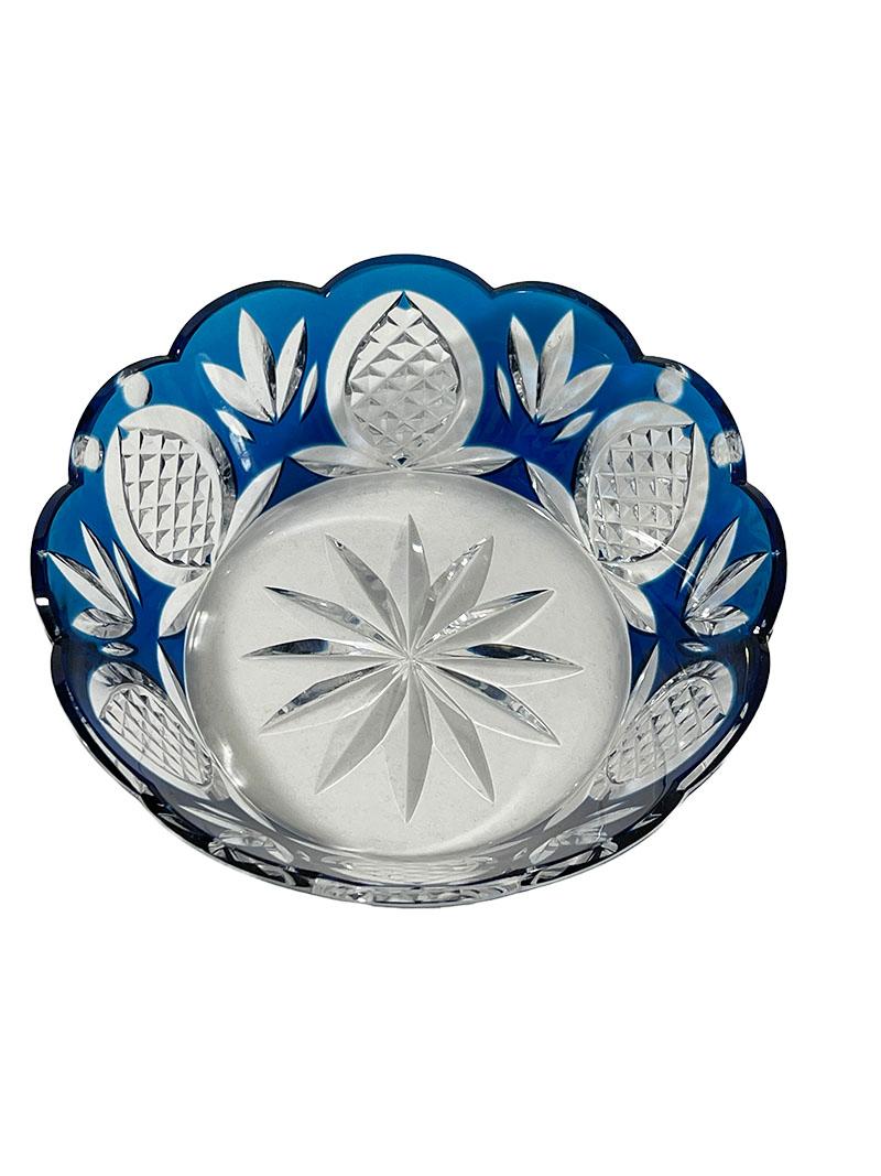 Val Saint Lambert blue crystal bowl, signed

A blue cut to clear crystal bowl from Val Saint Lambert, Belgium, established since 1826. The bowl with star shape on the bottom and pineapple cut on the round side with scalloped edges. 
The bowl is