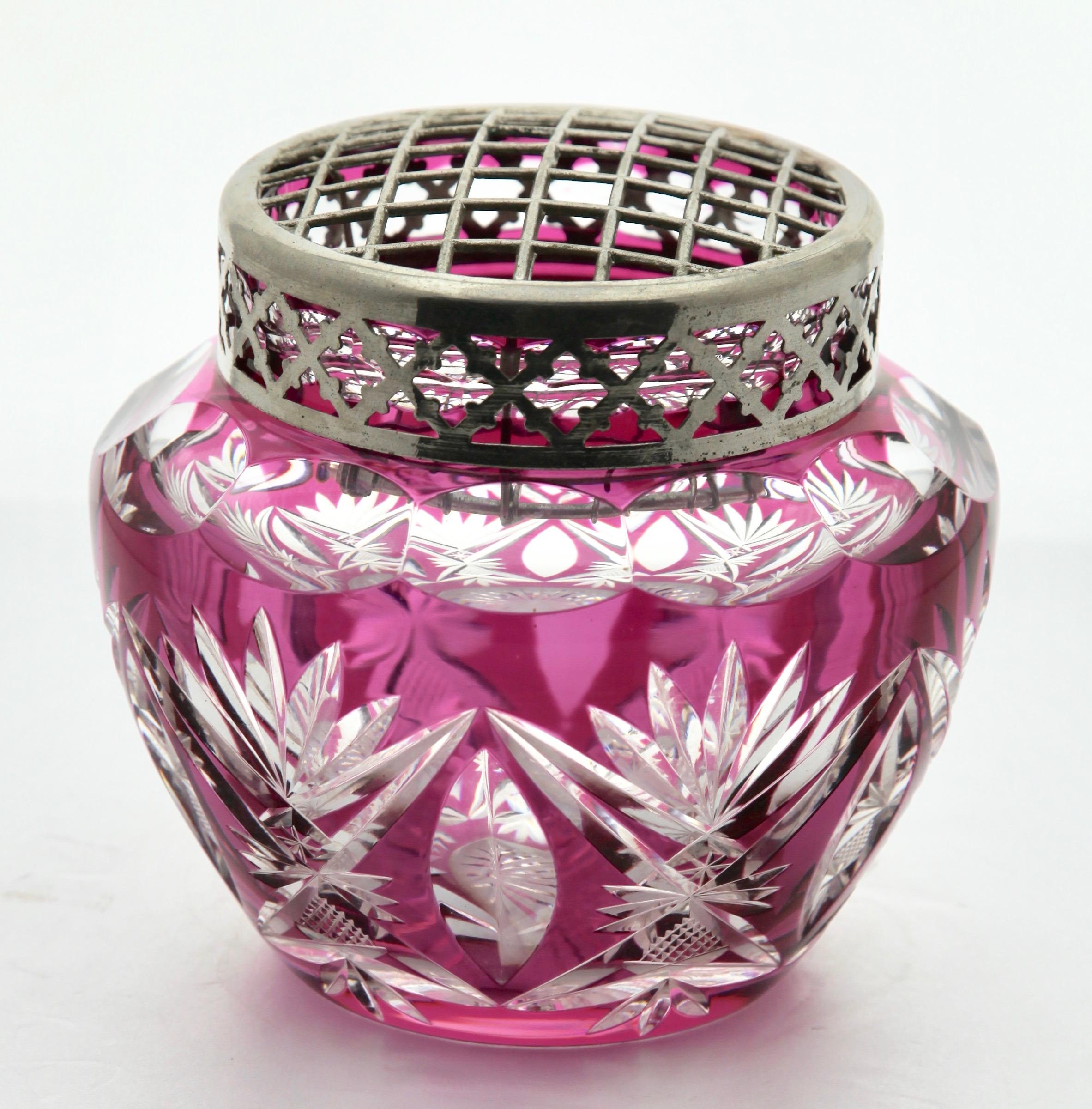 Val Saint Lambert 'Pique Fleurs' vase with original grille with cased amethyst glass crystal cut-to-clear.
Cut crystal design of palmettes and leaves onto a beautifully clear crystal base.

Made in Belgium in the 1930s and still in excellent