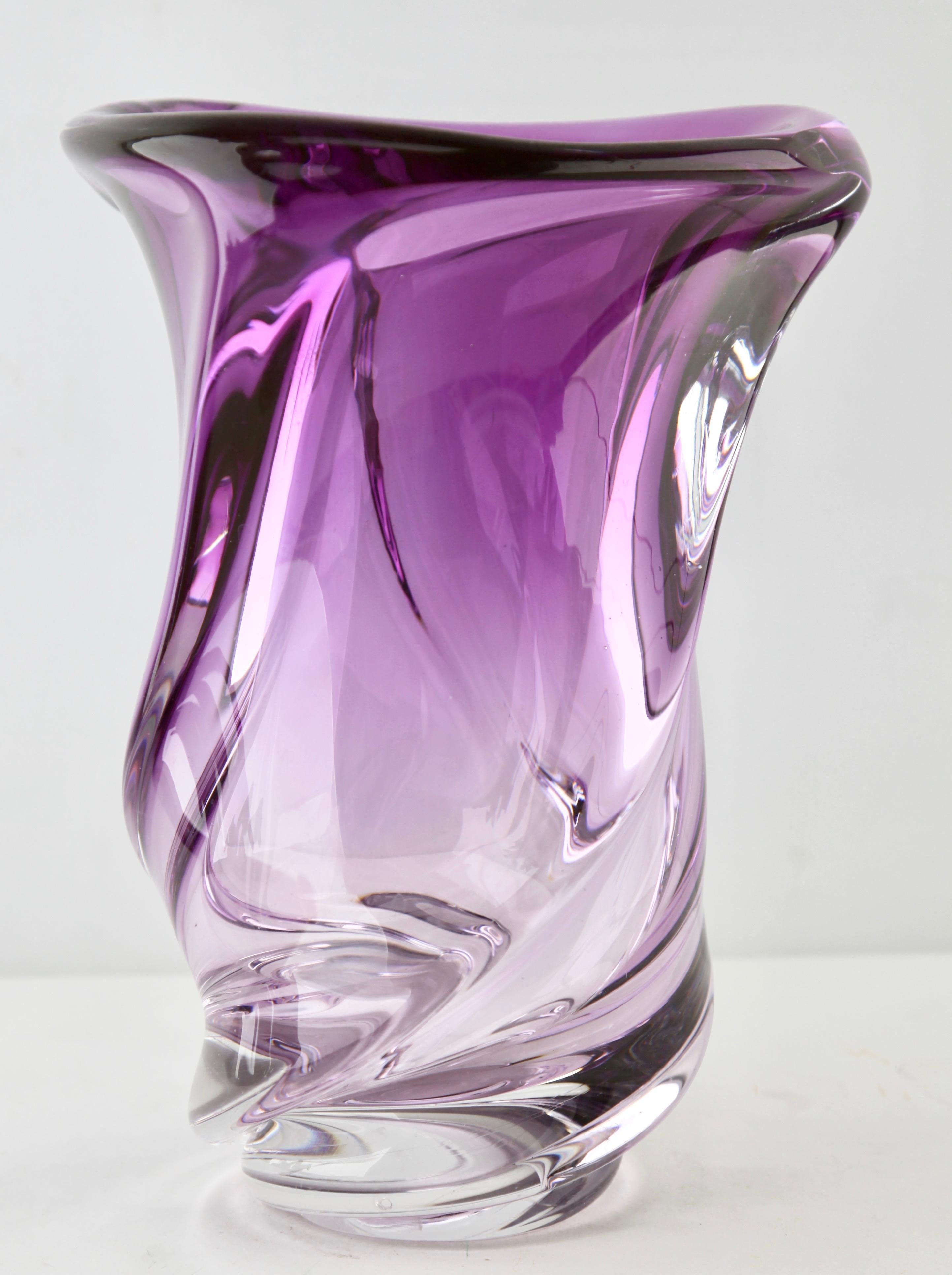 Val Saint Lambert vase, and signed shown in various factory catalogues, 1950s.

Beautiful Val Saint Lambert circular crystal vase, the glass is thick clear and Violet
Origin: Belgium in excellent condition. 

Weight crystal: 5.2 kg 11.46