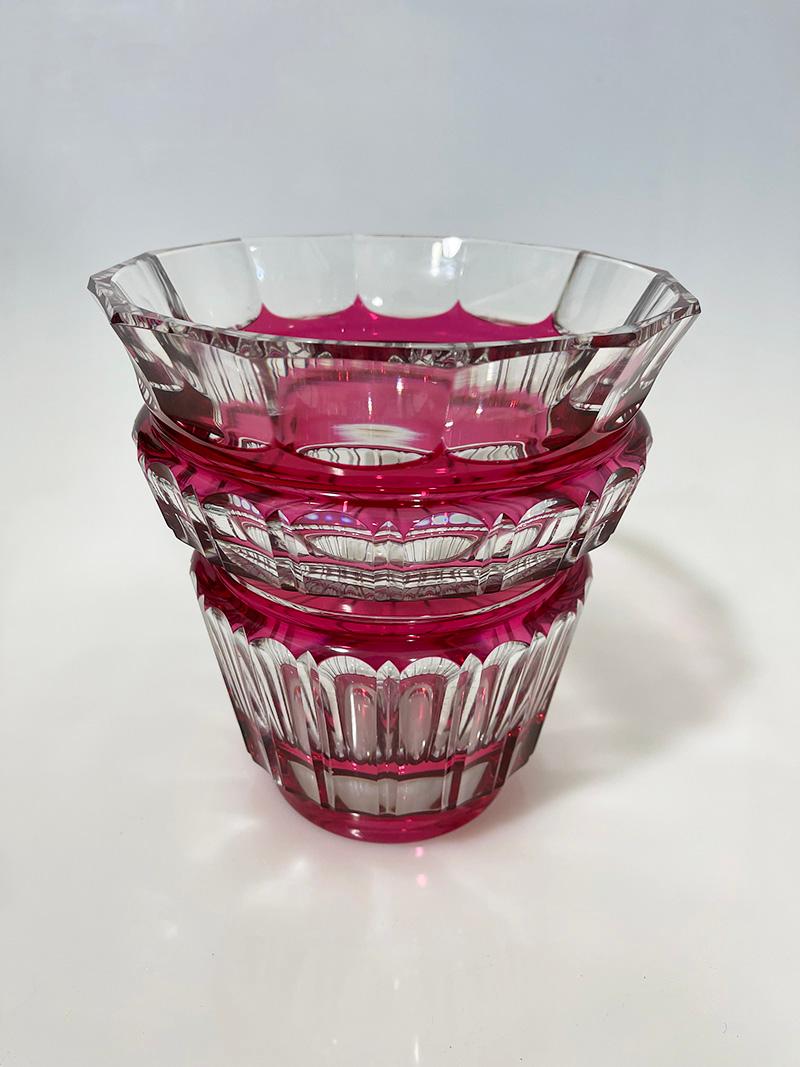 Val Saint Lambert cut-to clear Crystal vase, Signed, 1950s

A Cranberry cut to clear crystal bowl from Val Saint Lambert, Belgium, established since 1826. The vase with thick cut -to -clear crystal glass
The vase is signed. 
Shows minuscule traces