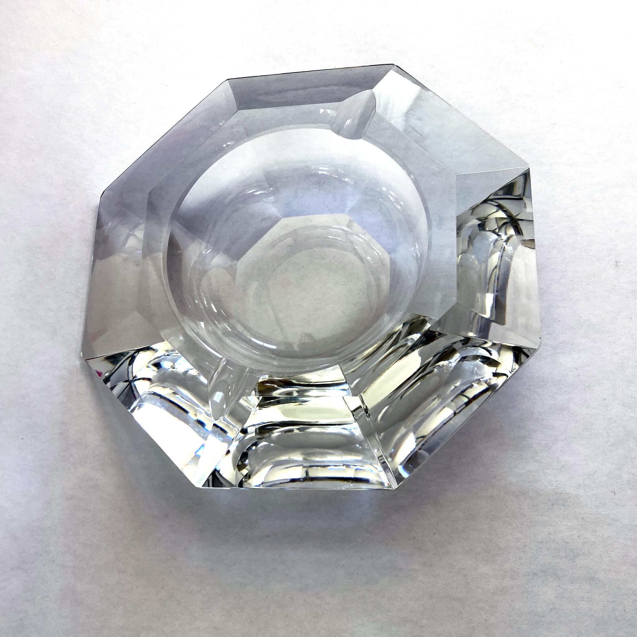 Stunning large crystal catchall/ ashtray by Val Saint Lambert, signed on bottom. The faceted shape catches the light at different angles, looks wonderful against colorful walls or white. This piece pairs beautifully with our crystal bud vase from