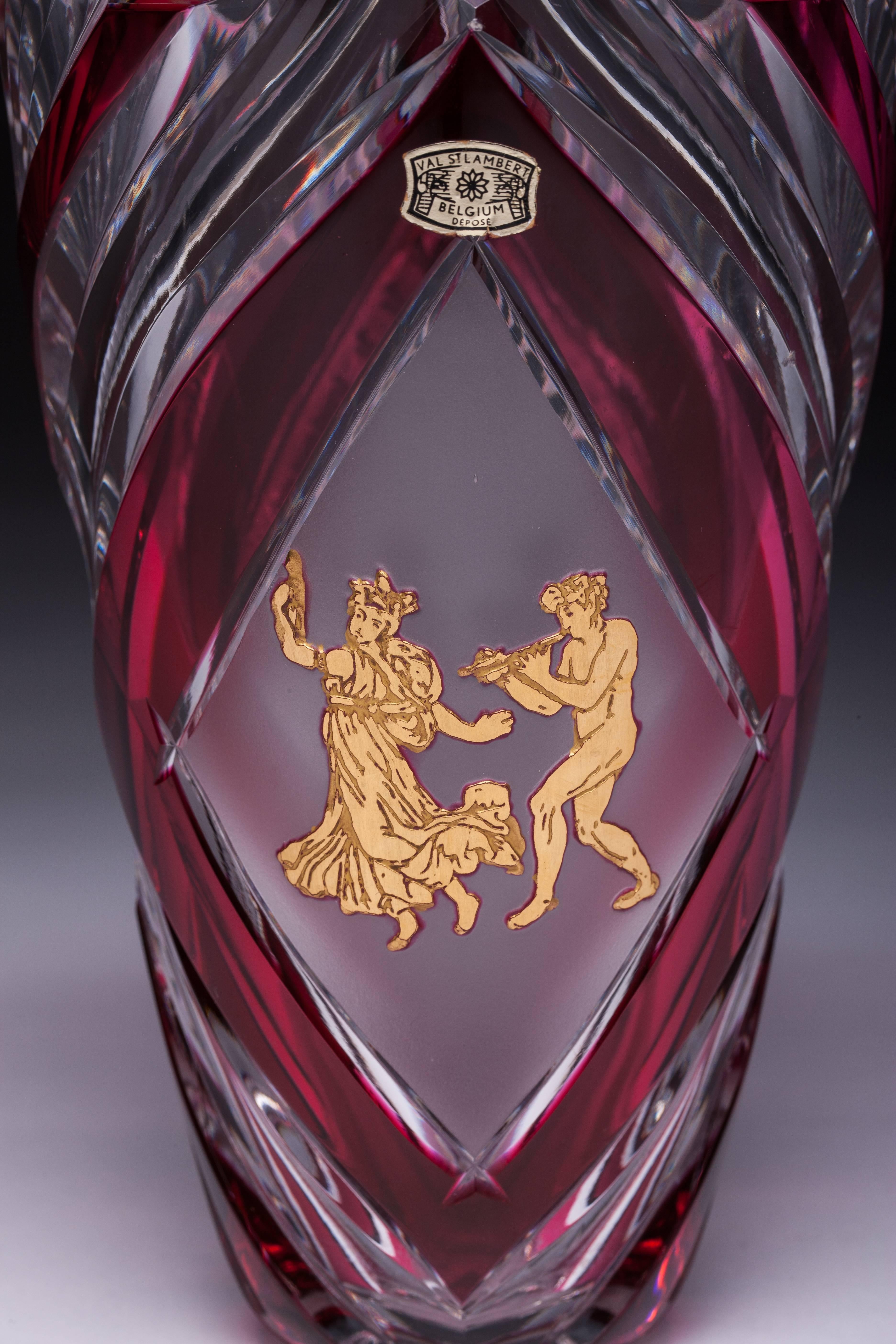 A charming Val Saint Lambert Beaudoin Rose ruby red art glass cordial vase, circa 1930. Beautiful frosted etched central image with heavily rich gilt Danse de Flore in the middle of the vase.

The glassworks of Val-Saint-Lambert were created in