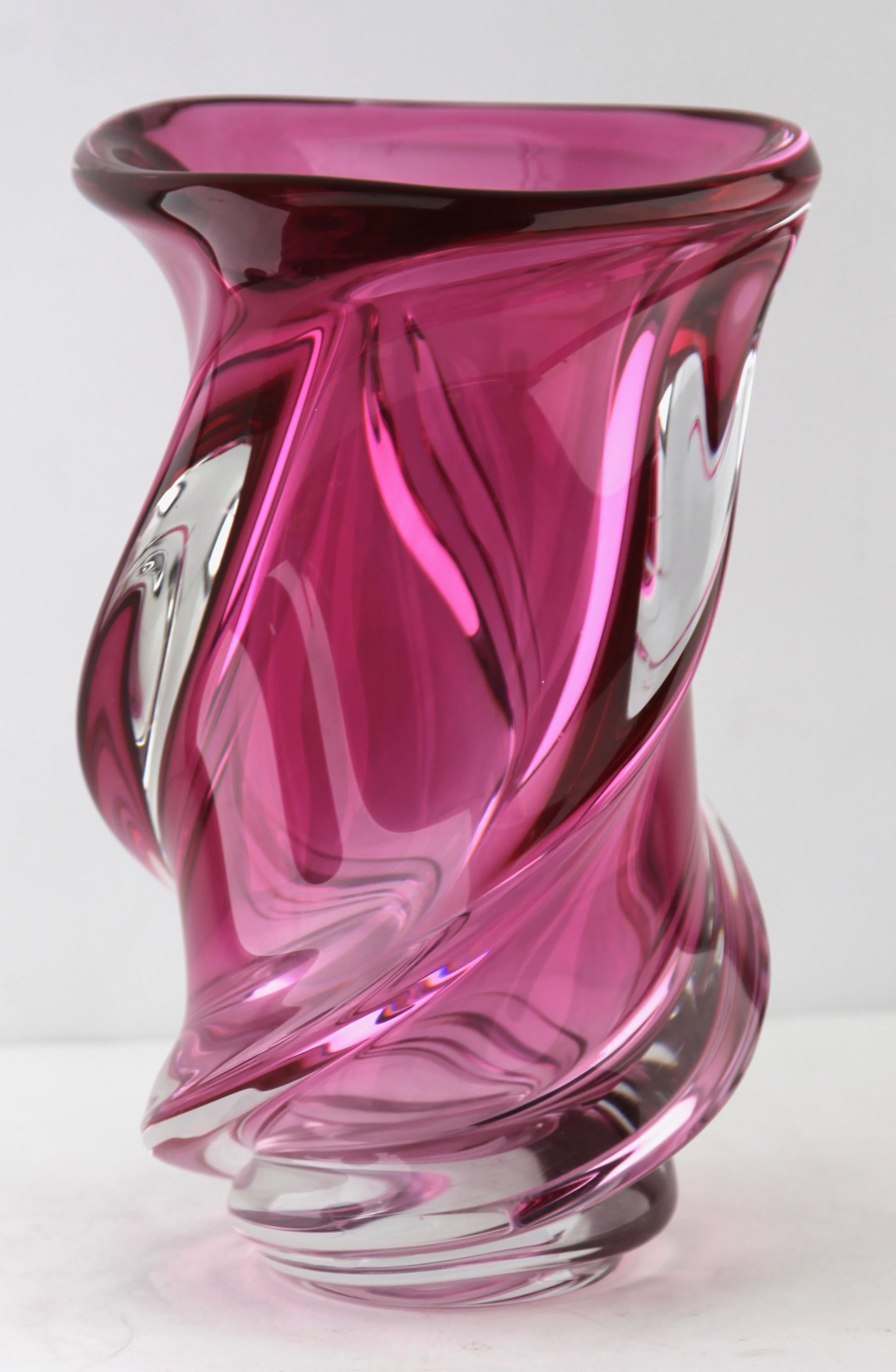 Heavy Val Saint Lambert crystal vase.
The central amethyst color (a traditional favorite for VSL) has been given a thick Sommerso (clear layer on the outside) and sculpted with subtle curves by the master craftsmen at Belgium's top factory.
A result