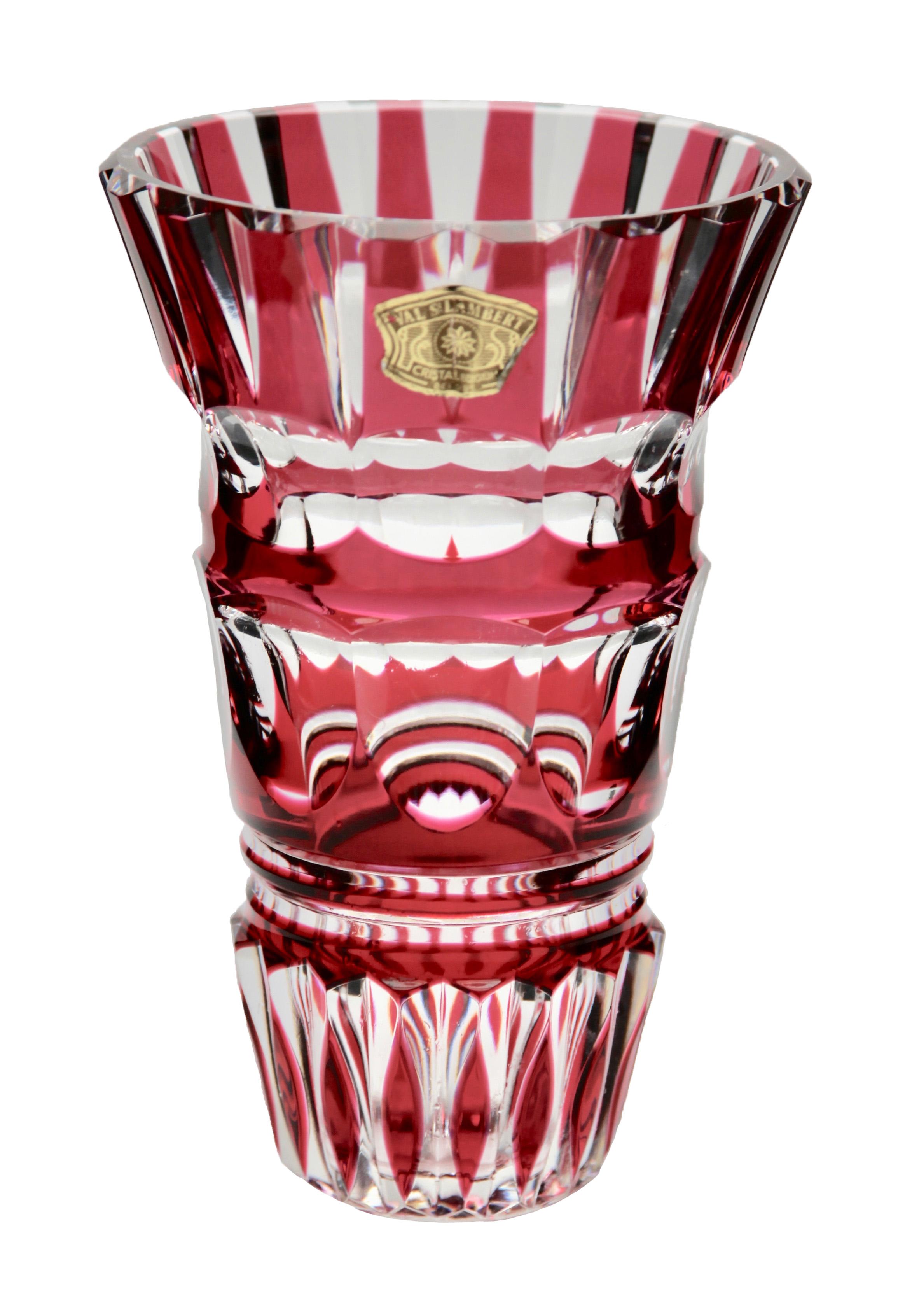 Val Saint Lambert vase Charles Graffart, catalogue, 1950s.

Beautiful Val Saint Lambert circular crystal vase, handcut-to-clear, the glass is thick, deeply and evenly cut.
A strong cranberry color, typical of Val St Lambert, casing a body of top