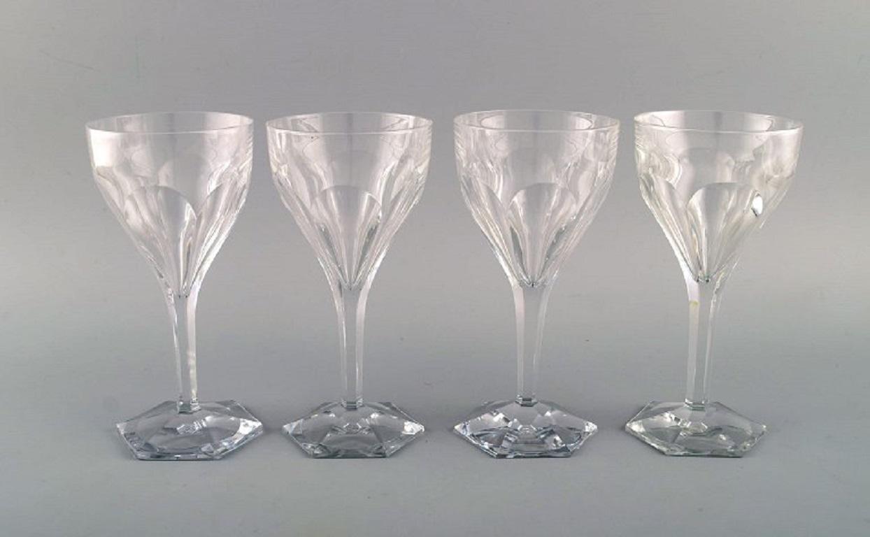 Val St. Lambert, Belgium. Four Legagneux red wine glasses in clear mouth-blown crystal glass. 
Mid-20th century.
Measures: 18.5 x 9 cm
In perfect condition.