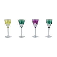 Val St. Lambert, Belgium. Four red wine glasses in faceted crystal. 1930s/40s.