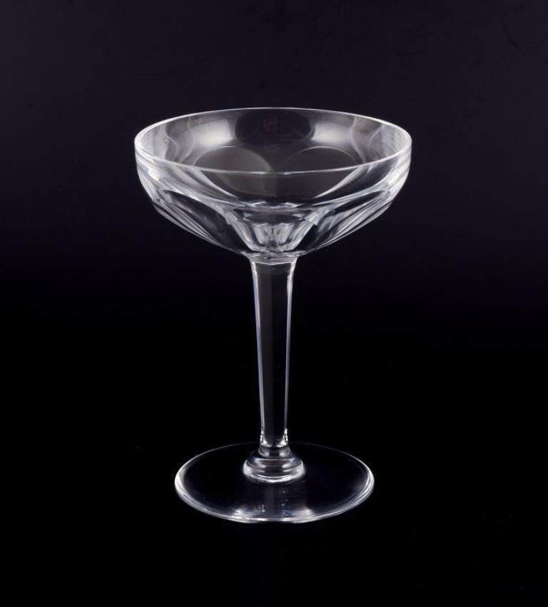 Val St. Lambert, Belgio.
Un set di sei coppe da champagne Art Deco in vetro di cristallo con steli alti e basi rotonde. Taglio sfaccettato. Realizzato a mano.
Dagli anni '30/'40.
Condizioni perfette.
Dimensioni: H. H. 13,5 cm x P. 10,0 cm.