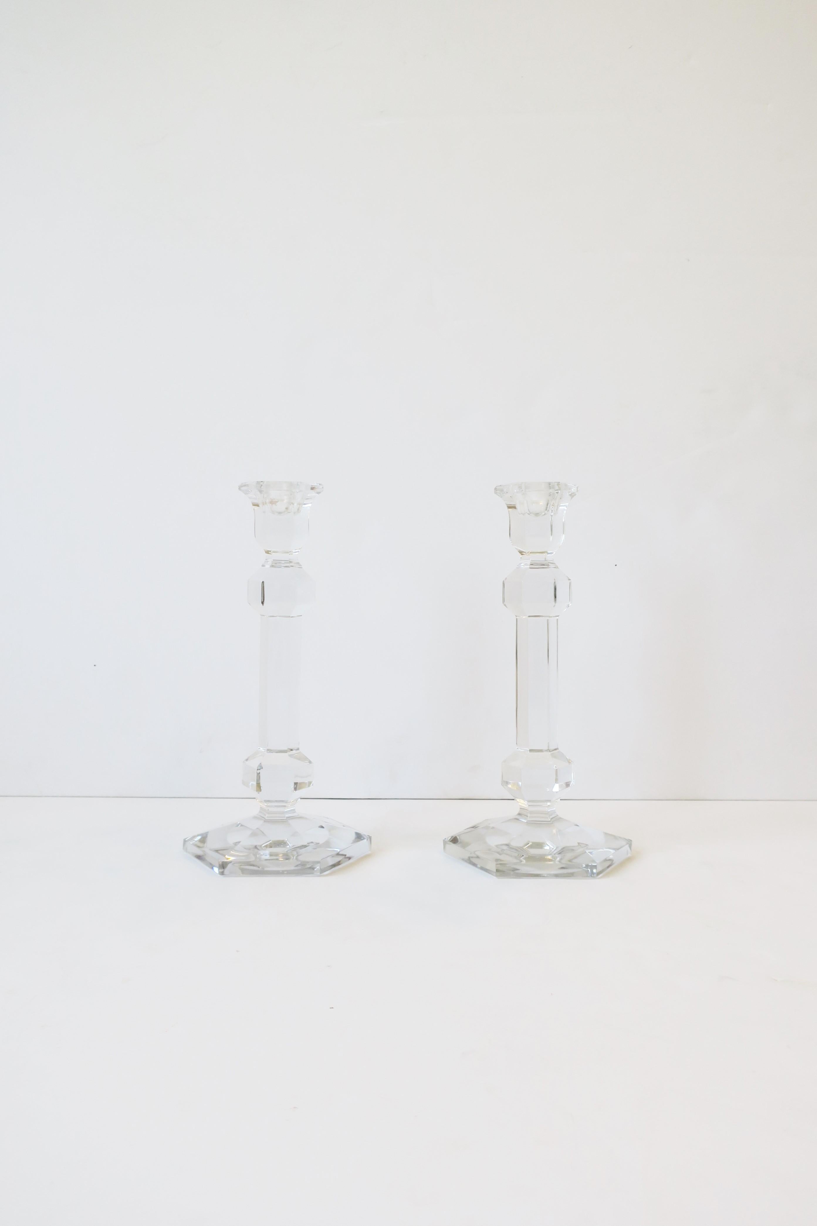 A beautiful pair of crystal candlestick holders from luxury maker Val Saint Lambert, Belgium. Pair have a Hexagon base and measure 9.63