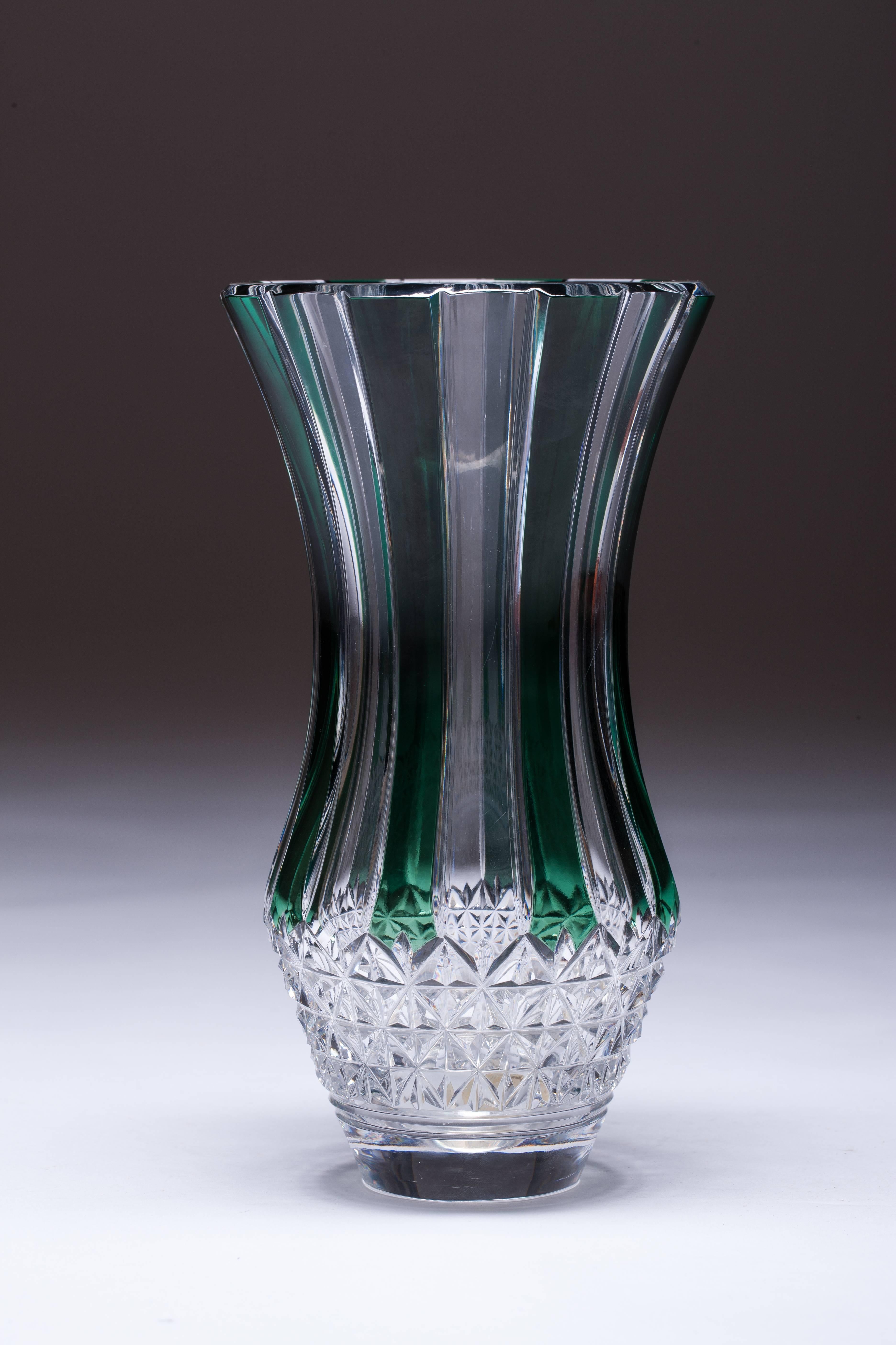 Green crystal handcrafted cut crystal glass vase.

Val St. Lambert Cristalleries of Belgium was founded by Messieurs Kemlin and Lelievre in 1825. The company is still in operation. All types of table glassware and decorative glassware have been
