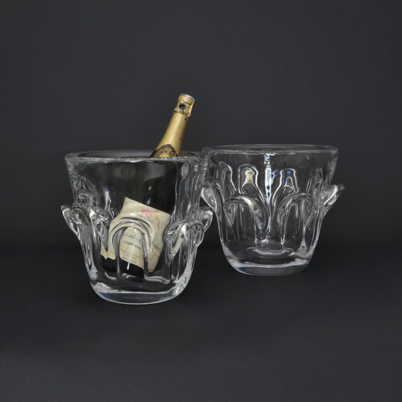 Handblown heavy crystal wine cooler by the renowned Belgian maker Val St Lambert who were established in 1826 and who's crystal is considered the clearest and brightest in the world.
These particular wine coolers were designed and made for the