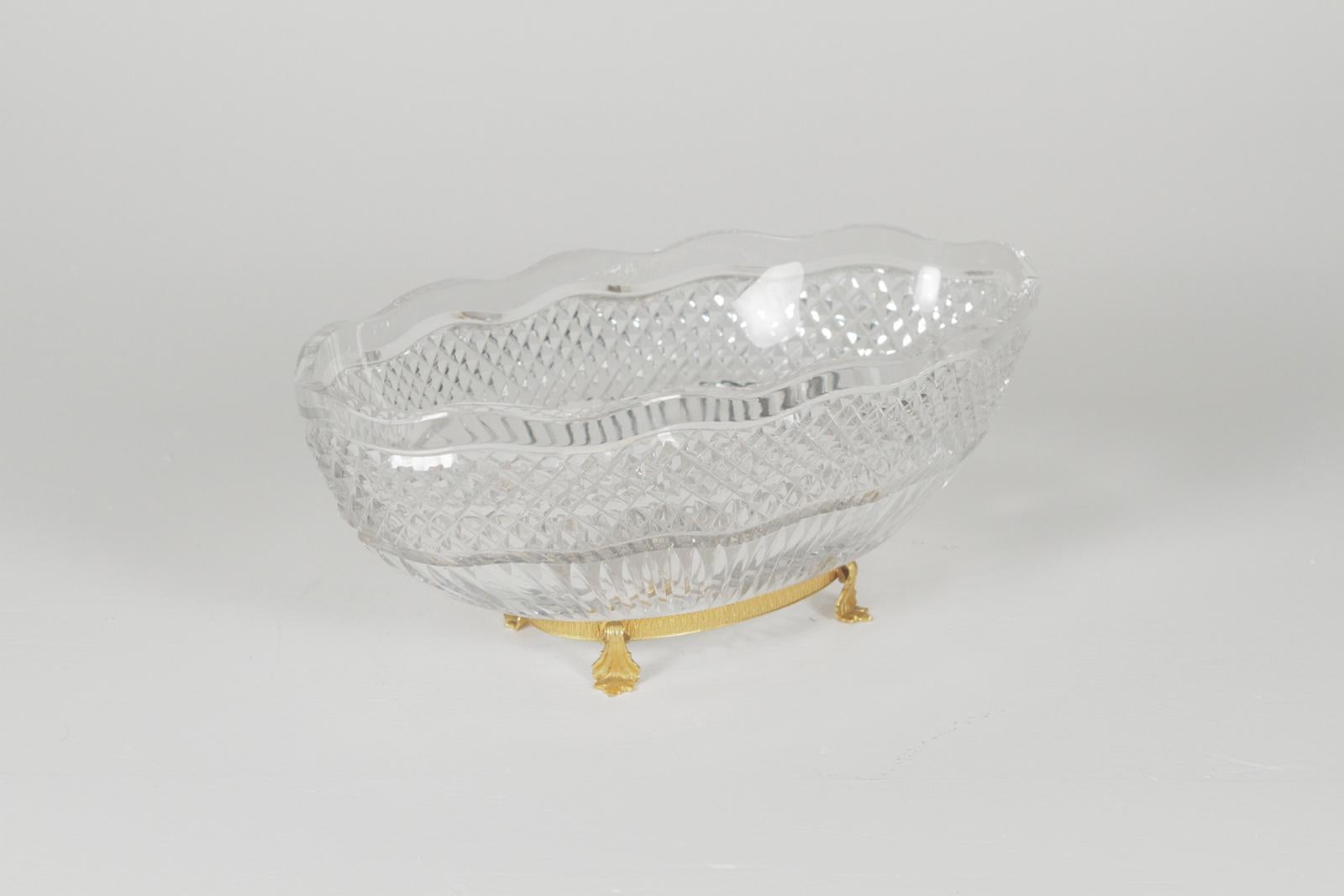 Val St. Lambert Cut Glass Centerpiece Bowl On A Gold Gilt Bronze Base. The oval bowl with all over diamond cuts resting on a gilt bronze footed base.