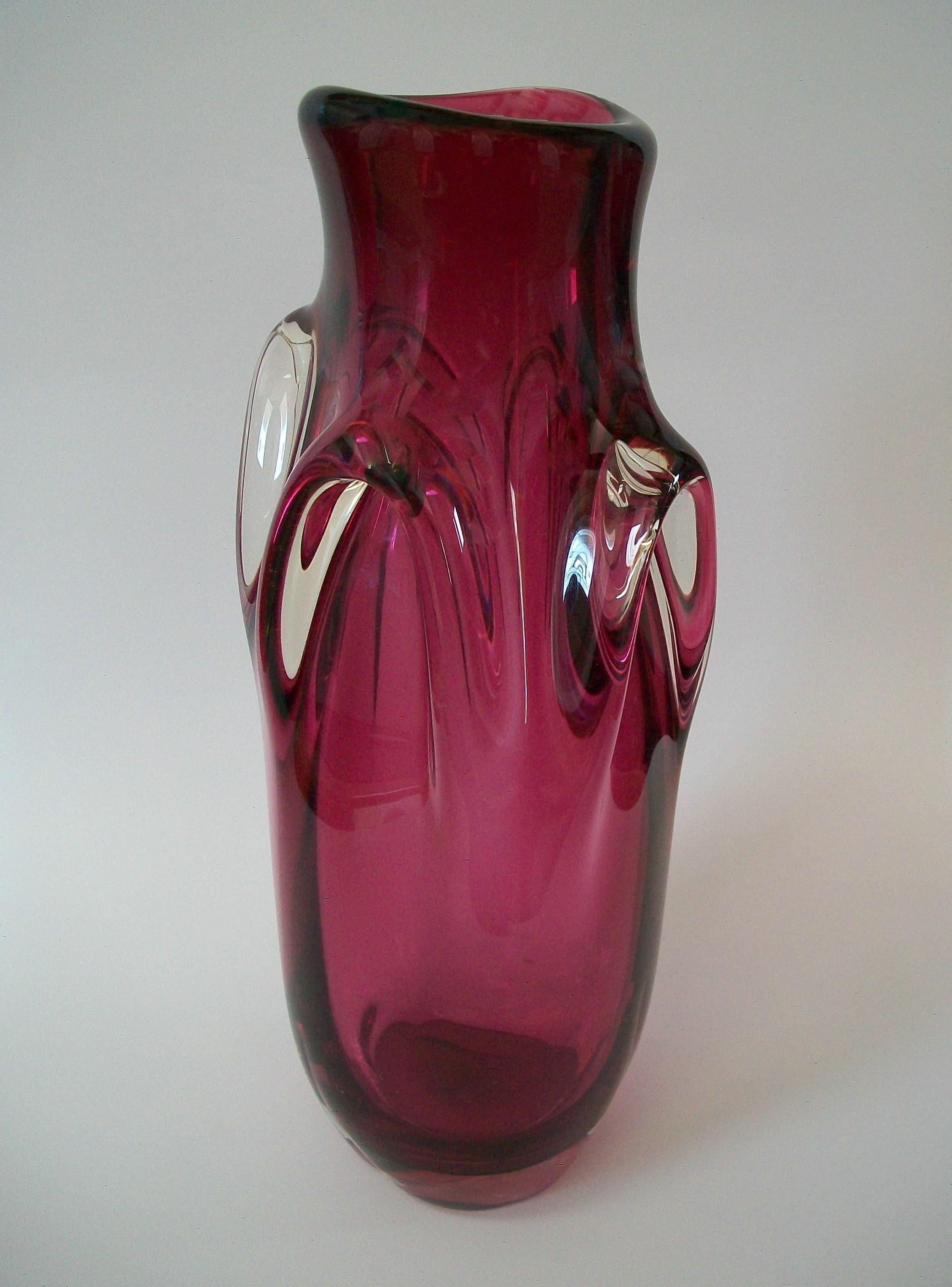 VAL SAINT LAMBERT (Manufacturer - Attributed) - GUIDO BON (Designer - Attributed) - Large Mid Century studio glass vase - featuring staggered clear glass arches (typical of Guido Bon's designs) - striking pink / cranberry color to the body -