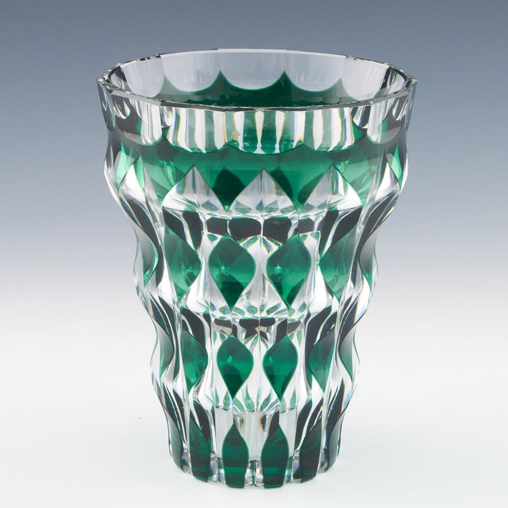 Val St Lambert Jonquille Vase, Mid 20th Century

Additional Information:
Heading : Mid 20th Century Val St Lambert  Jonquille Vase
Date : Mid-century
Origin : Belgium
Bowl Features : Green and clear cased and cut design
Type : Lead
Size :  H 17