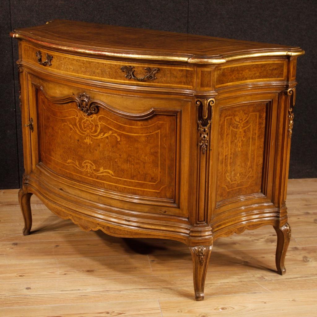 Italian sideboard from the mid-20th century. Furniture inlaid in walnut, burl, maple, boxwood and beech with beautifully decorated gilded and lacquered elements. Sideboard of Turinese production V. Valabrega (see photo). Sideboard with one door and