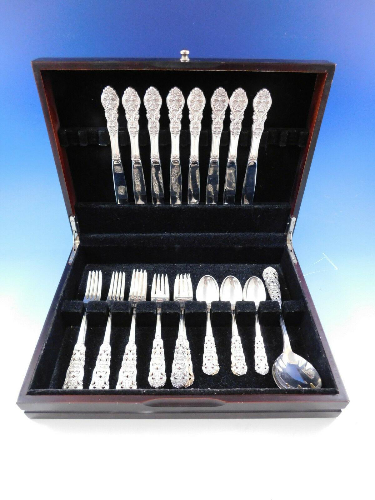 Valdres by Th. Marthinsen (Norway) sterling silver flatware set with ornate pierced handle, 34 pieces. This set includes:

8 dinner knives, 9 1/4