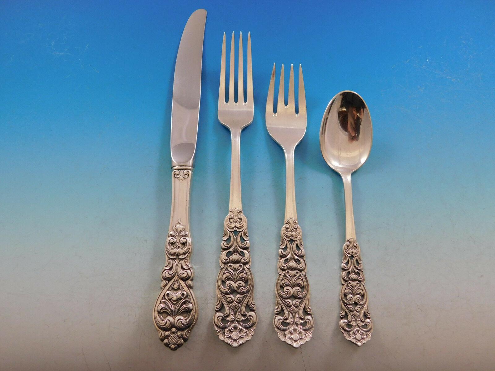 Dinner size Valdres by Th. Marthinsen (Norway) sterling silver flatware set with ornate pierced handle, 73 pieces. This set includes:

12 dinner size knives, 9 1/4