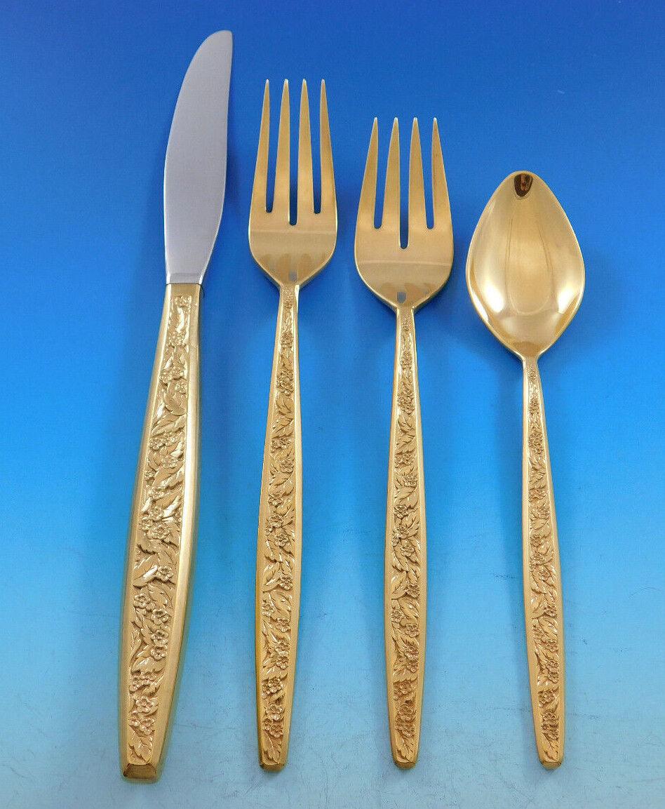 Valencia Vermeil by International gold over Sterling silver Flatware set, 63 pieces. The Valencia pattern was introduced in the year 1964 and features a contemporary elongated handle with an allover decorative floral & leaf pattern on the front.