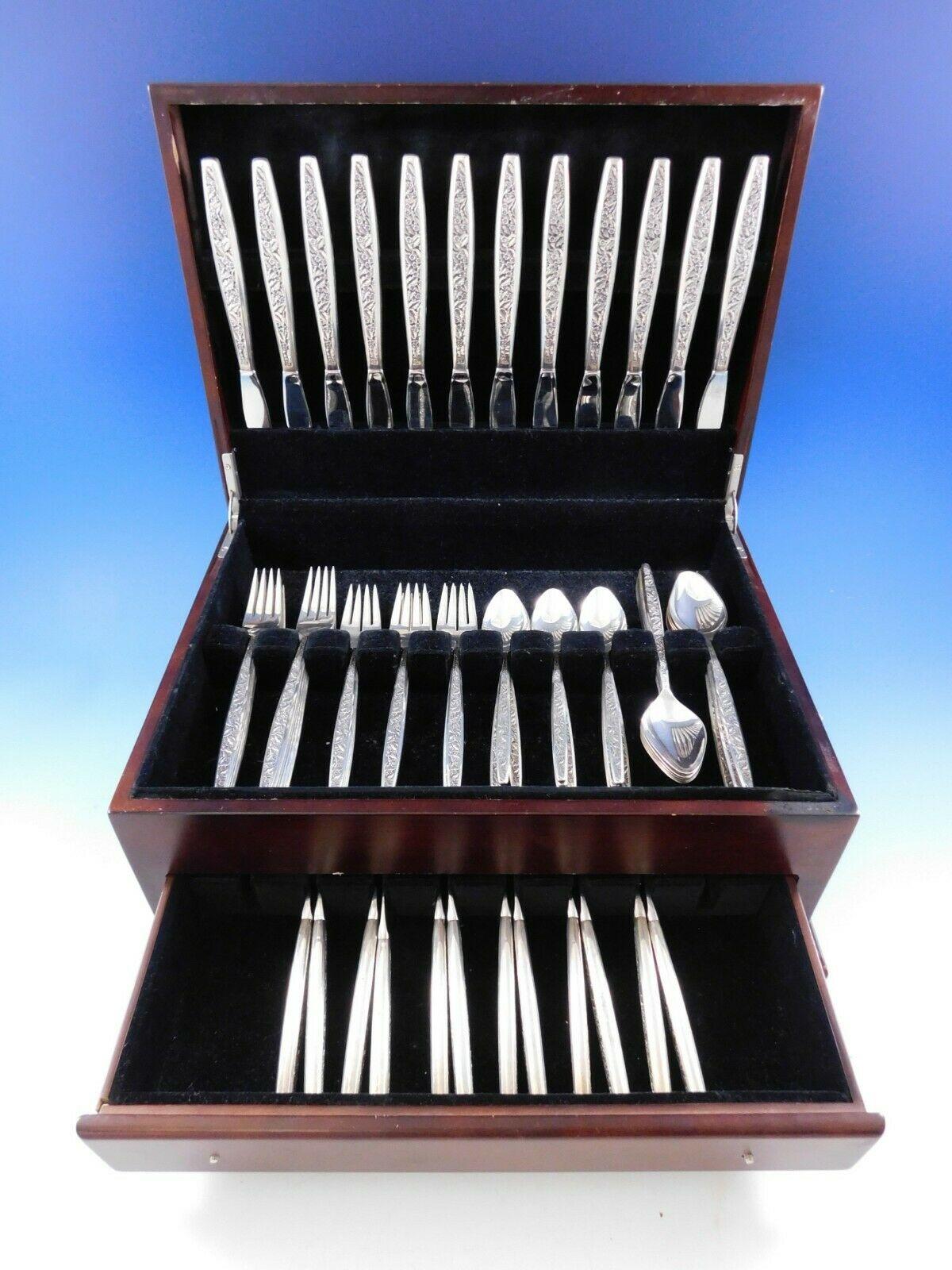 Valencia by International Sterling silver flatware set, 72 pieces. The Valencia pattern was introduced in the year 1964 and features a contemporary elongated handle with an all-over decorative floral & leaf pattern on the front. This set