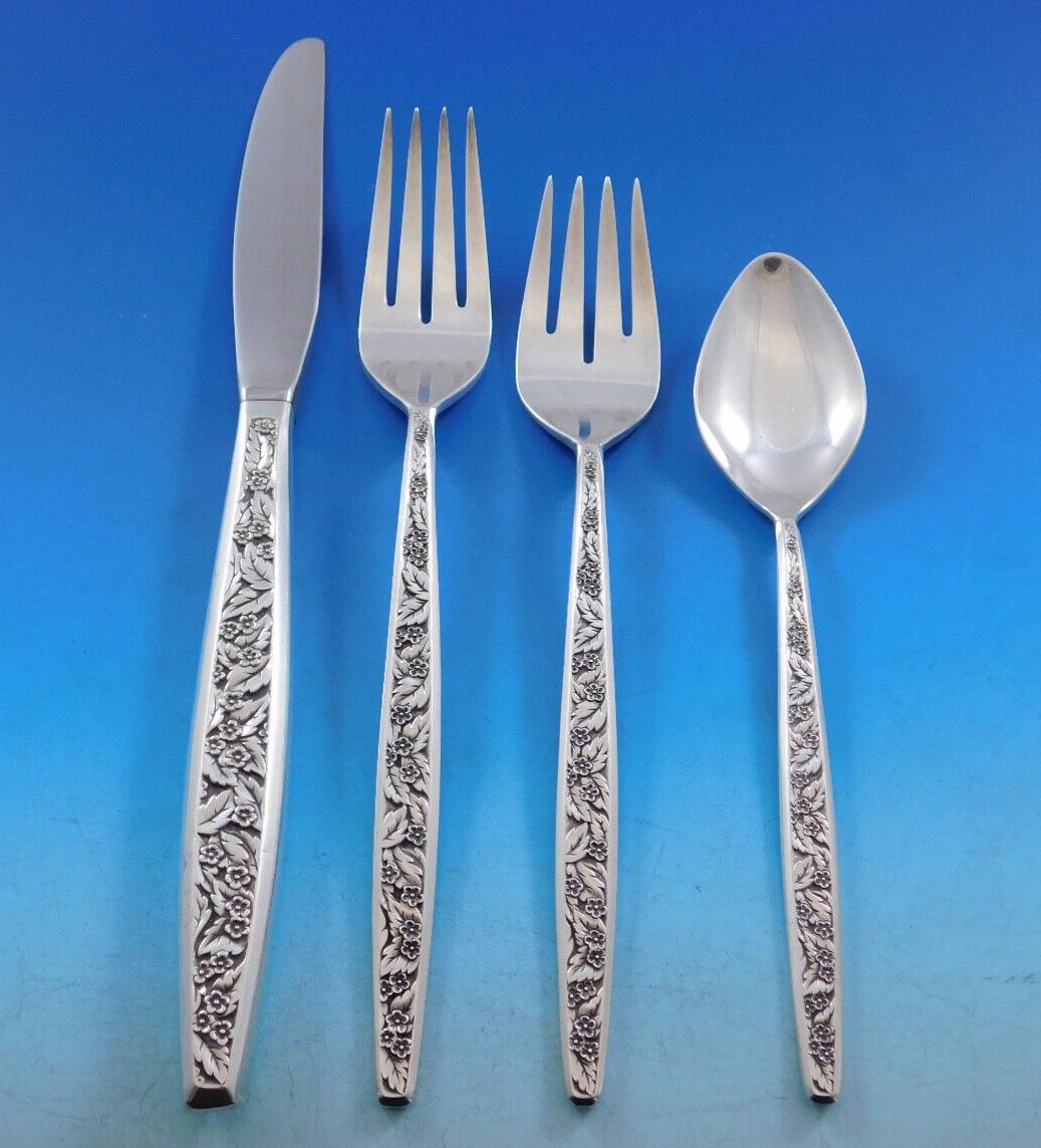 Stunning Valencia by International Sterling silver Flatware set, 90 pieces. The Valencia pattern was introduced in the year 1964 and features a contemporary elongated handle with an allover decorative floral & leaf pattern on the front. This set