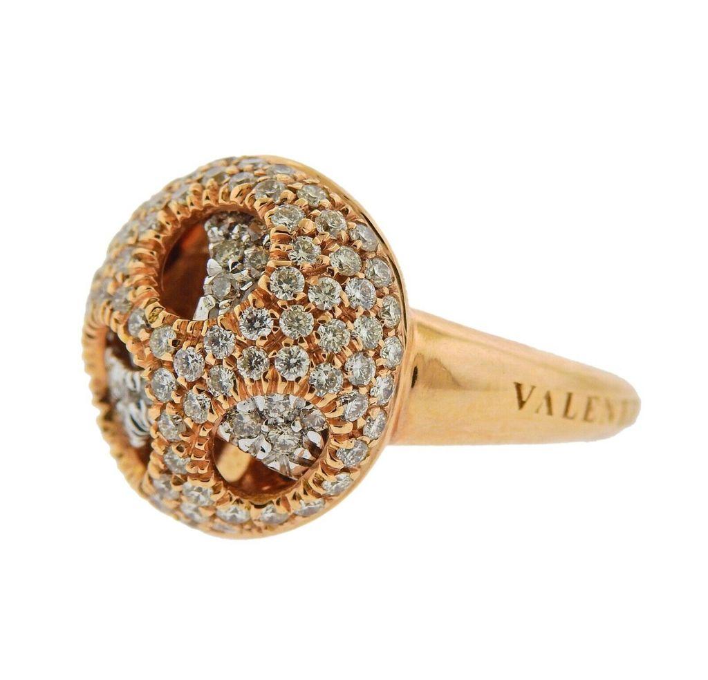 18k gold ring crafted by Valente. Ring features 1.40ctw in VS GH diamonds. Ring size - 7.25, ring top - 17mm in diameter. Total weight 9.9 grams. Marked Valente, Italian mark, 750.



