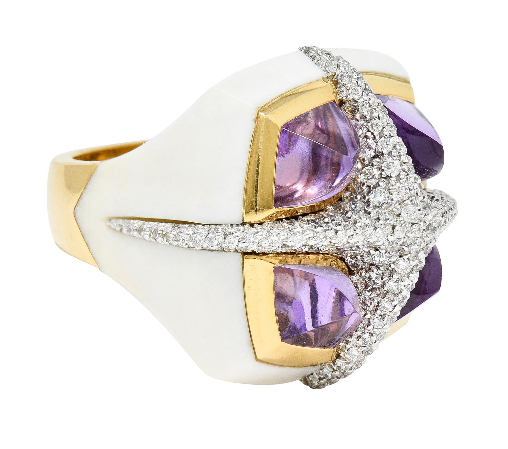 Substantial ring features a pavè diamond pyramidal X form

Round brilliant cut diamonds weigh in total approximately 2.25 carats - G/H color with SI clarity

Each quadrant features a sugarloaf cabochon of amethyst - well matched in light pinkish