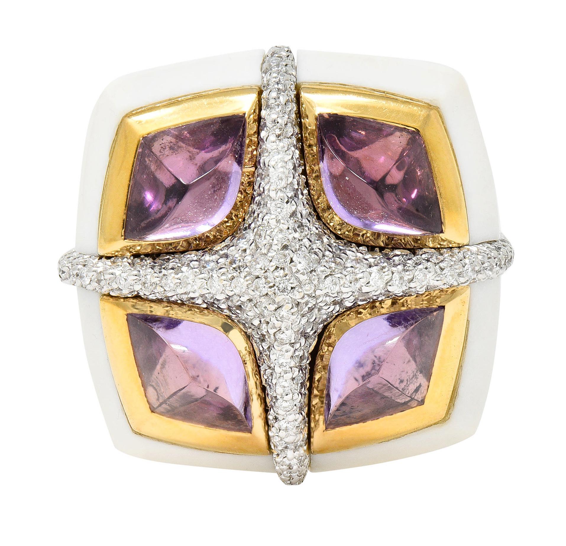 Substantial ring features a pavè diamond pyramidal X form

Round brilliant cut diamonds weigh in total approximately 2.25 carats - G/H color with SI clarity

Each quadrant features a sugarloaf cabochon of amethyst - well matched in light pinkish