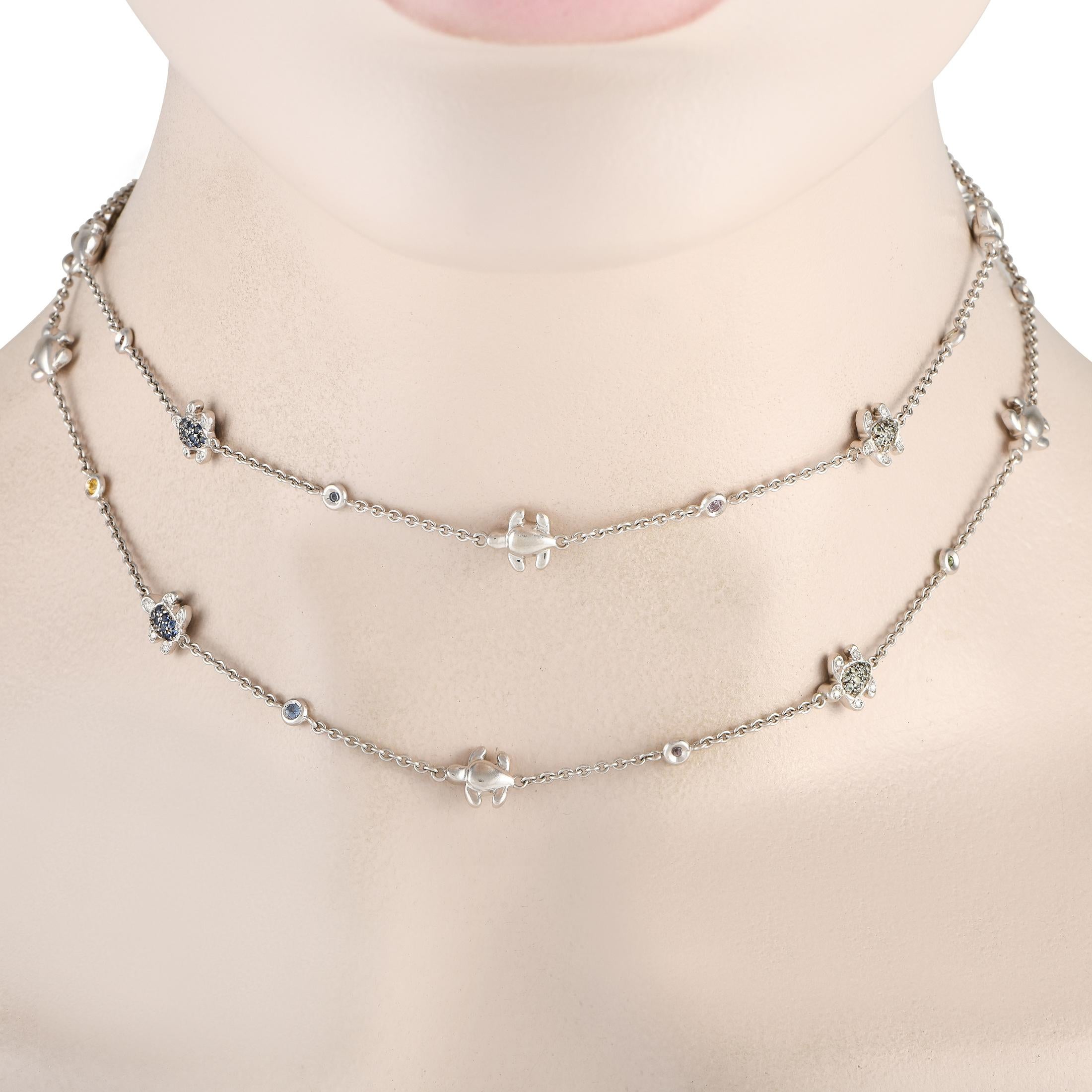 This charming Valentine Milano necklace will earn you endless compliments. Crafted from 18K White Gold, this delicate design features turtle motifs throughout the 30” chain. Colored Sapphire gemstones put the perfect finishing touch on this