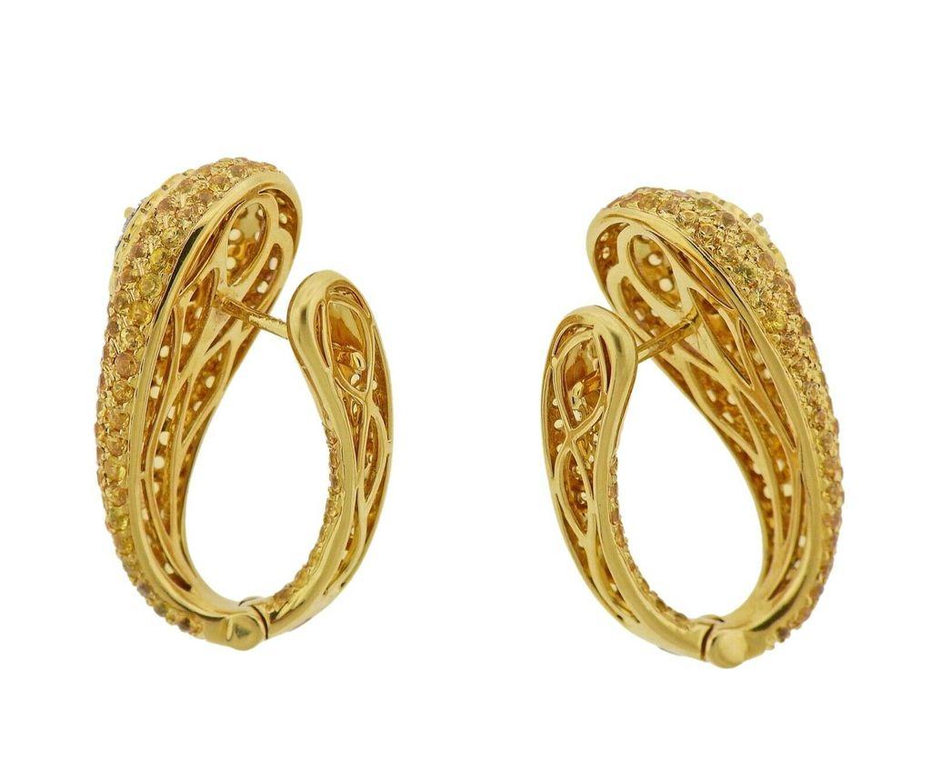 18k gold earrings crafted by Valente. Earrings feature approx 0.23ctw in VS GH diamonds multi-color sapphires. Earrings are 28mm x 14mm. Total weight 15.2 grams. Marked Valente, 750.