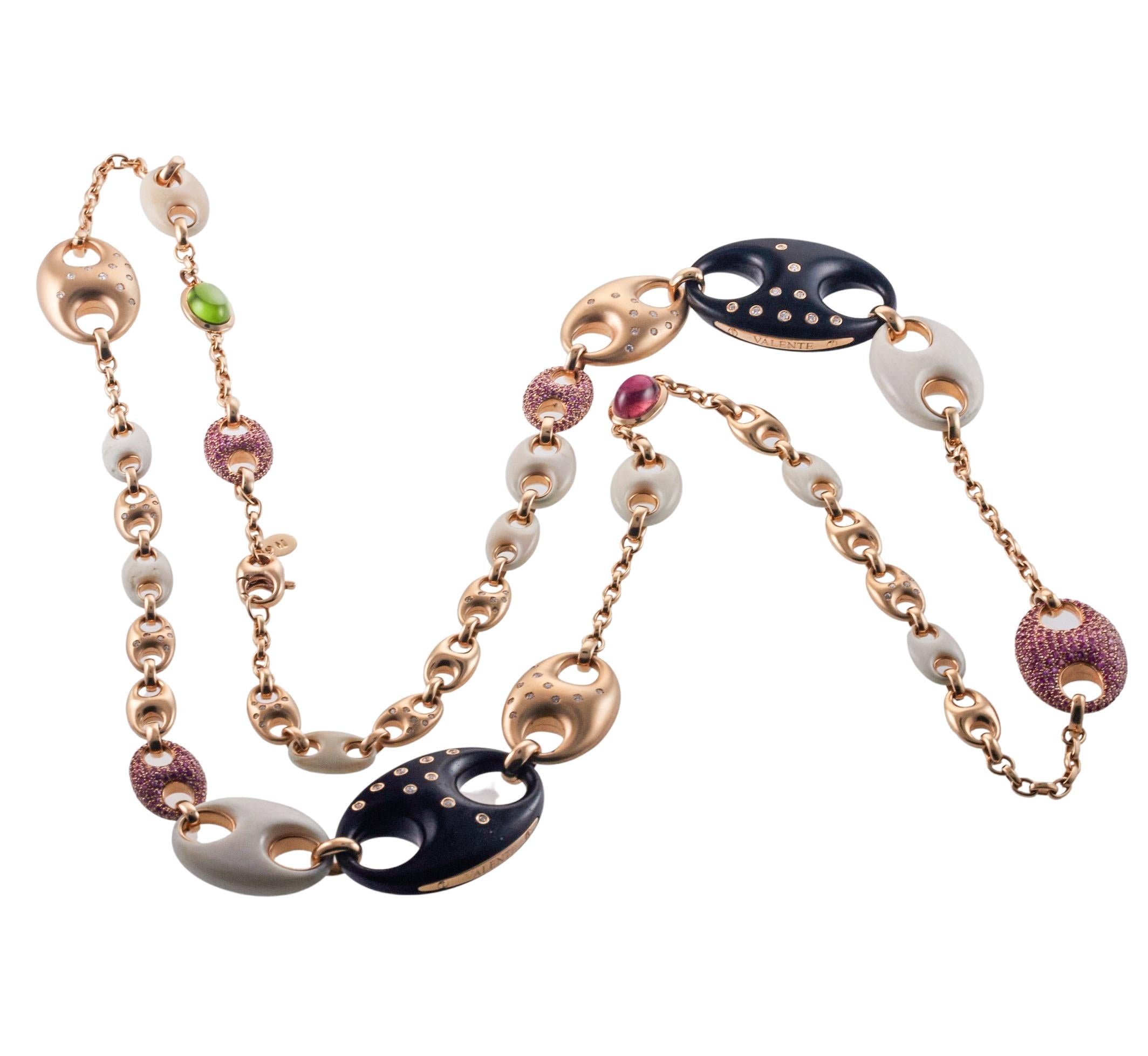 18k rose gold and wood station necklace by Valente, elaborated with pink sapphires, green and pink tourmalines, approx. 1.50ctw in VS/G diamonds. Necklace measures 46