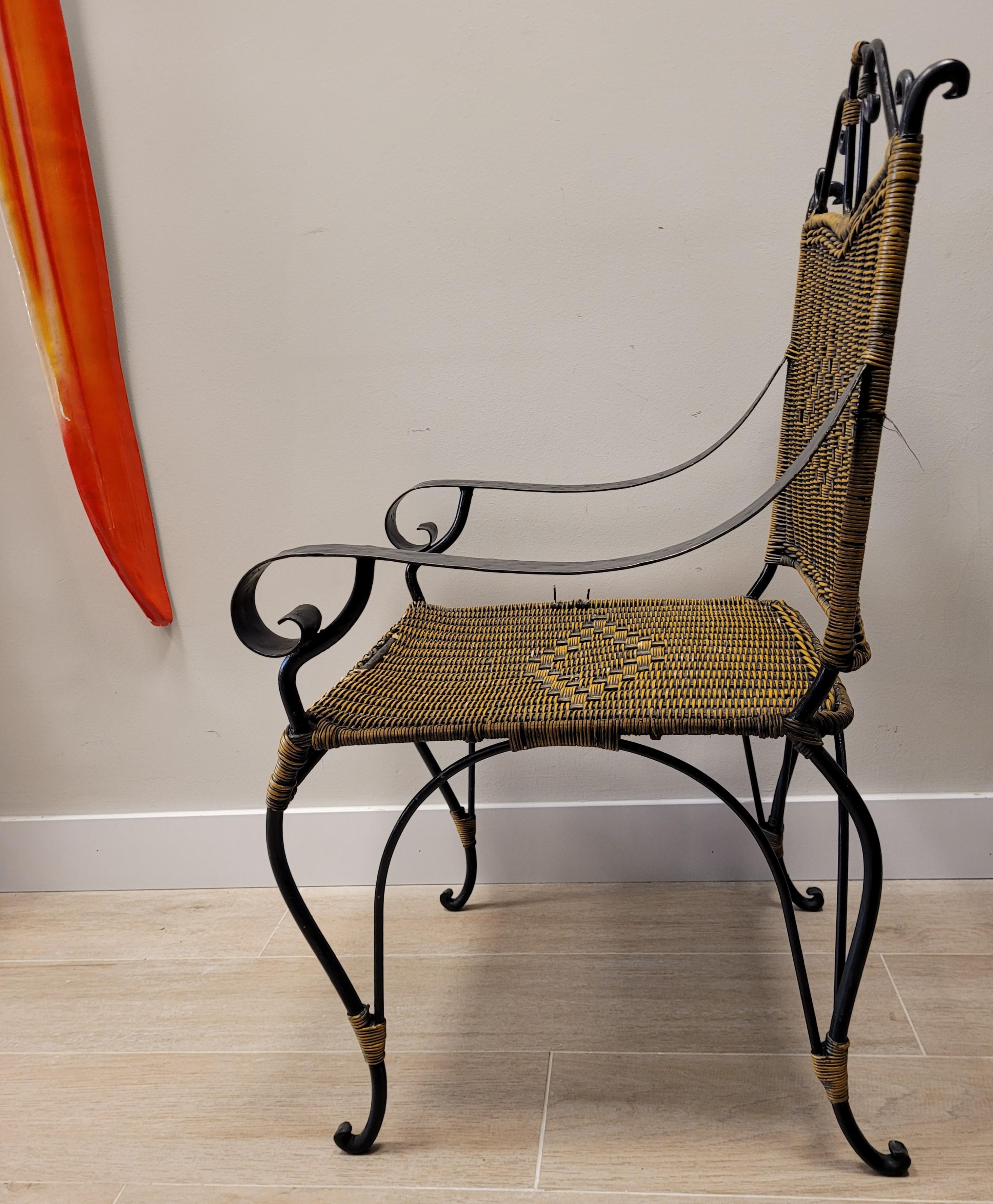 Fine XX secolo Valenti armchair in black rattan and wrought iron from the Spanish manufacturer in vendita