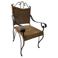 Valenti armchair in black rattan and wrought iron from the Spanish manufacturer