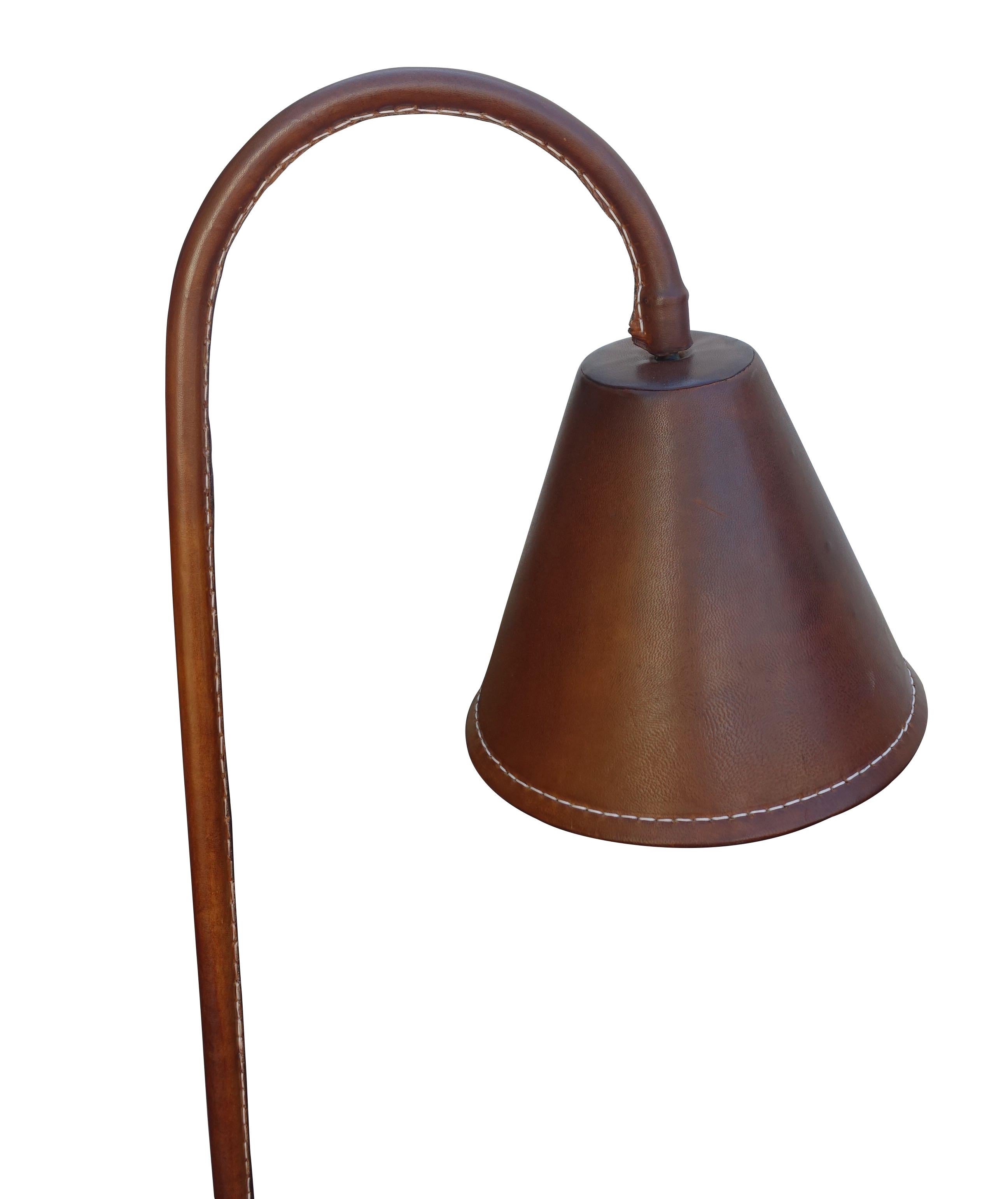 Midcentury Spanish classic Valenti style brown leather floor lamp.
Shade, base and upright all in brown leather.
Recently restored and rewired.
Measures: Shade is 9