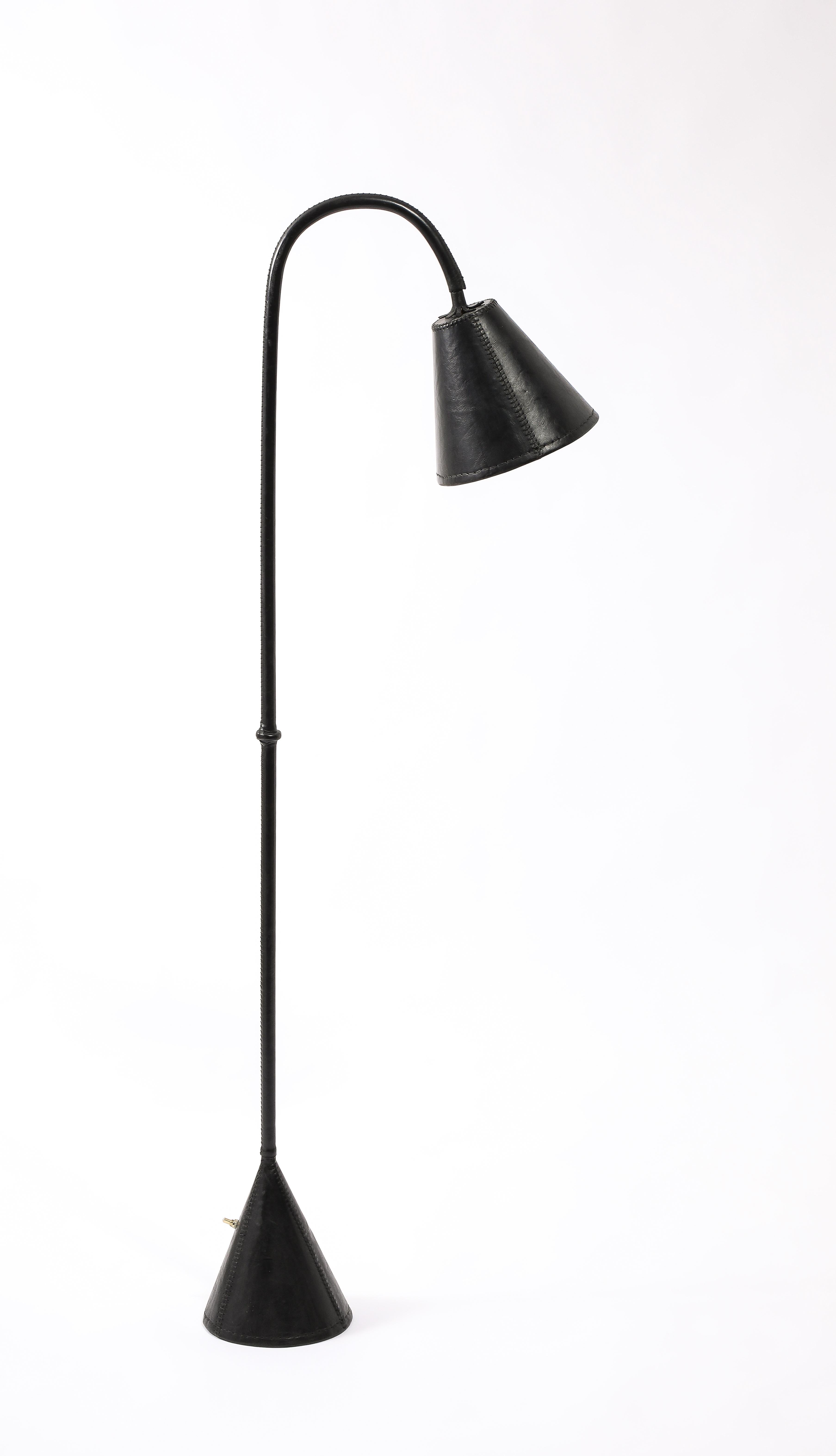 Classic dual cone design with an unusual whipstitched construction
