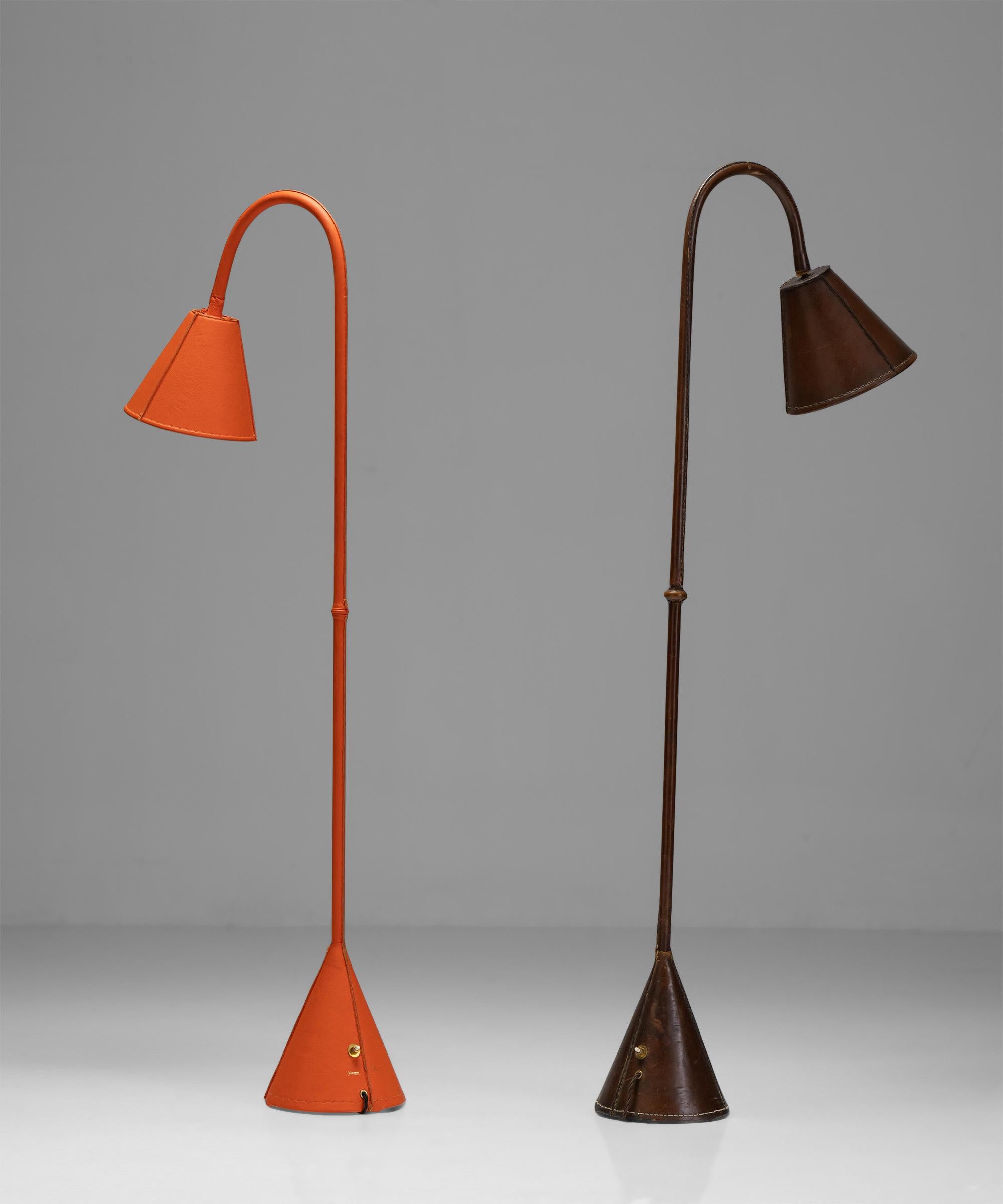 Valenti leather floor lamps

Spain Circa 1950

Saddle-stitched distressed leather over steel. With articulating shade, on/off switch on base of lamp. Stamped Valenti / Made in Spain.

Measures: 8.5