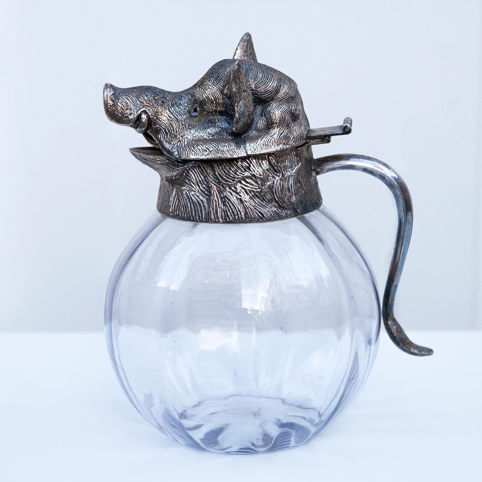 Elegant silver plated wild boar head carafe signed by Valenti, Spain, 1970.

 