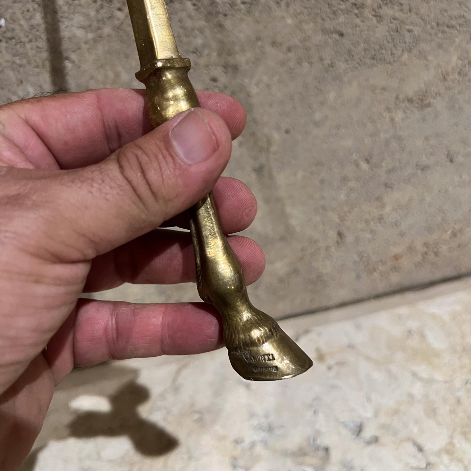 Valenti Letter Opener Modernist design Spain
maker stamped
Solid Brass
Equestrian Horse Hoof exquisite detail
1 x 10.25
Original vintage
Refer to images