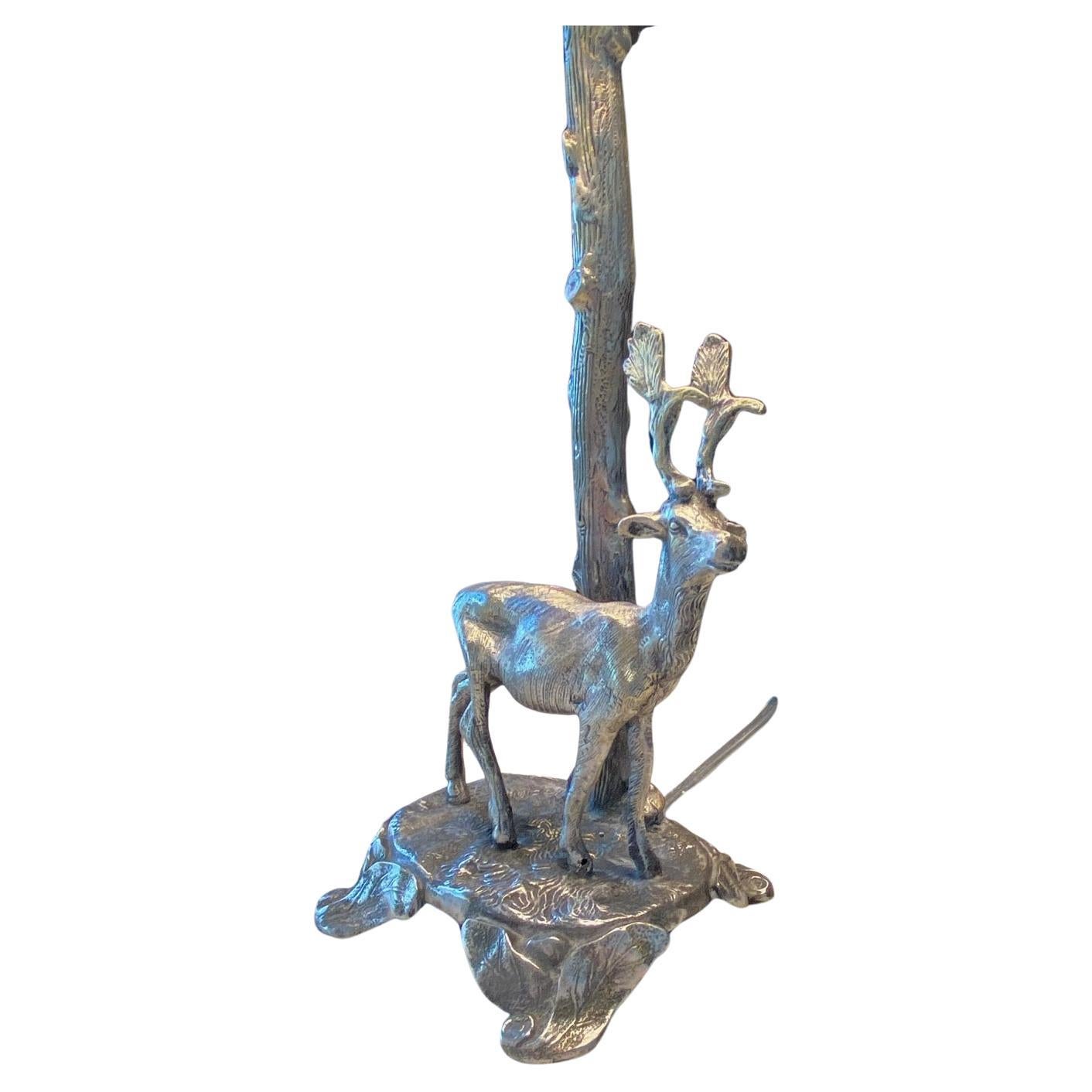 Valenti style stag table lamp, unsigned. Fine midcentury quality solid silvered plate on bronze sculpture most likely by the highly sought after Spanish artist Valenti. This sculpture depicts a wild stag or deer under a beautifully sculpted simple
