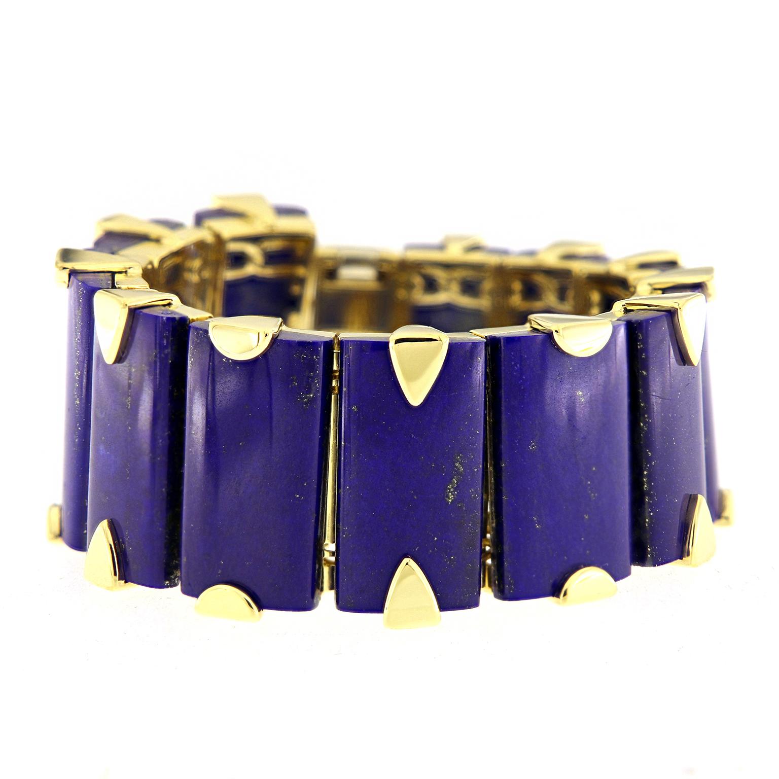 Valentin Magro 12 Tapering Rectangular Lapis Bracelet in 18 Karat Yellow Gold is blue and gold and lovely all over. Lapis lazuli rectangles sit in a row, forming a jeweled line. Prongs in 18k yellow gold hold the gems in place while serving as a