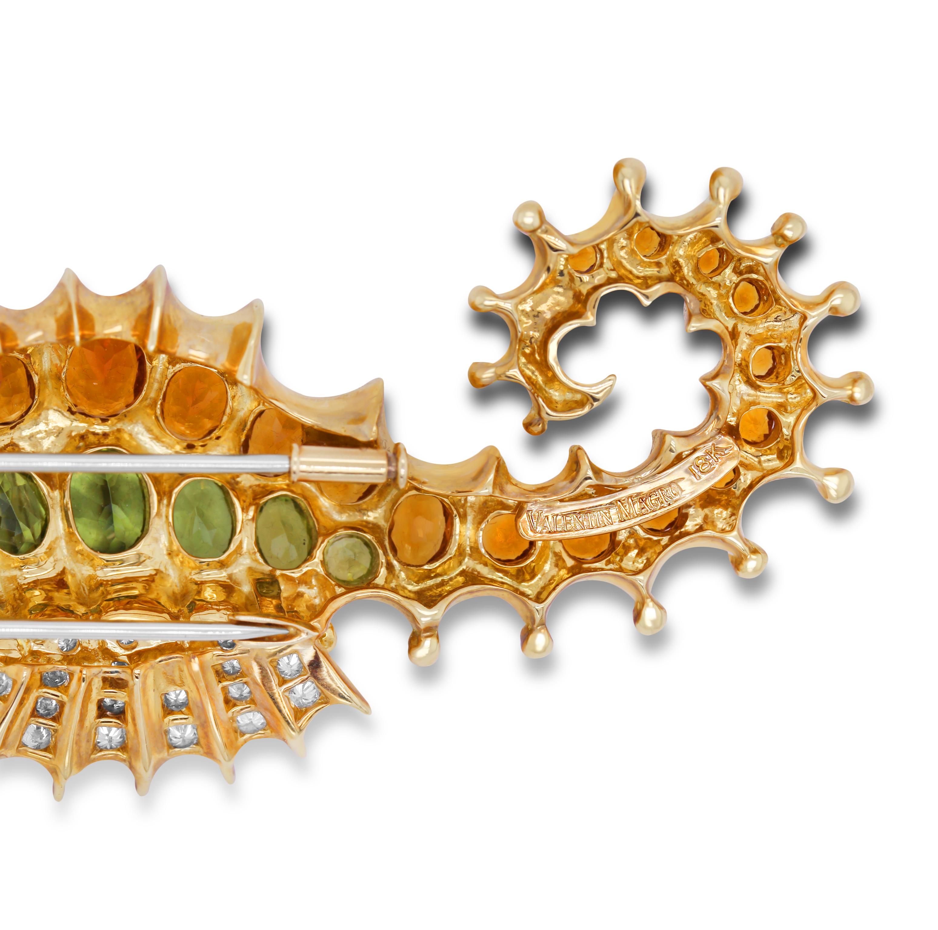 Valentin Magro 18K Gold Seahorse Brooche Madeira Citrine Peridot Diamond Emerald

18k yellow gold forms the body of the seahorse, with detail given to its scalloped body and orbs down the back to its curved tail. Brilliant cut diamonds embellish the