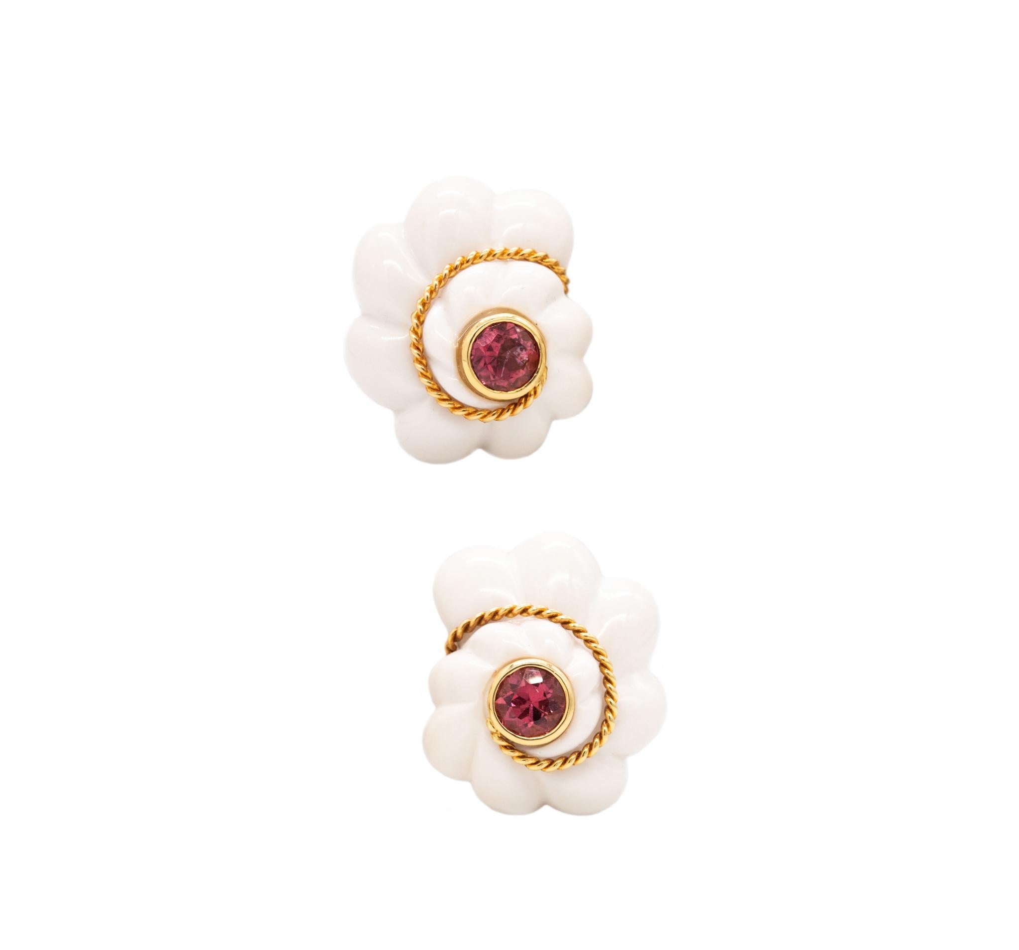 Pair of earrings designed by Valentin Magro.

A modern and sculptural beautiful pair, crafted in solid 18 karats of high polished yellow gold. They was conceived as a mirrored swirl pair and suited with hinged omega backs for fastening clips. The