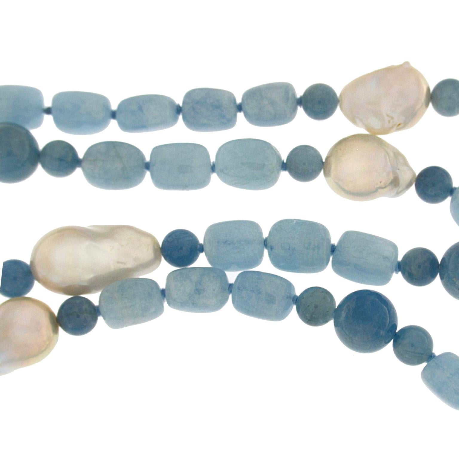 32 inch freshwater baroque pearls with mirror cut aquamarine and 18kt gold rondelles