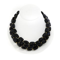 Collier en or jaune 18 carats à trois rangs de spinelles noires